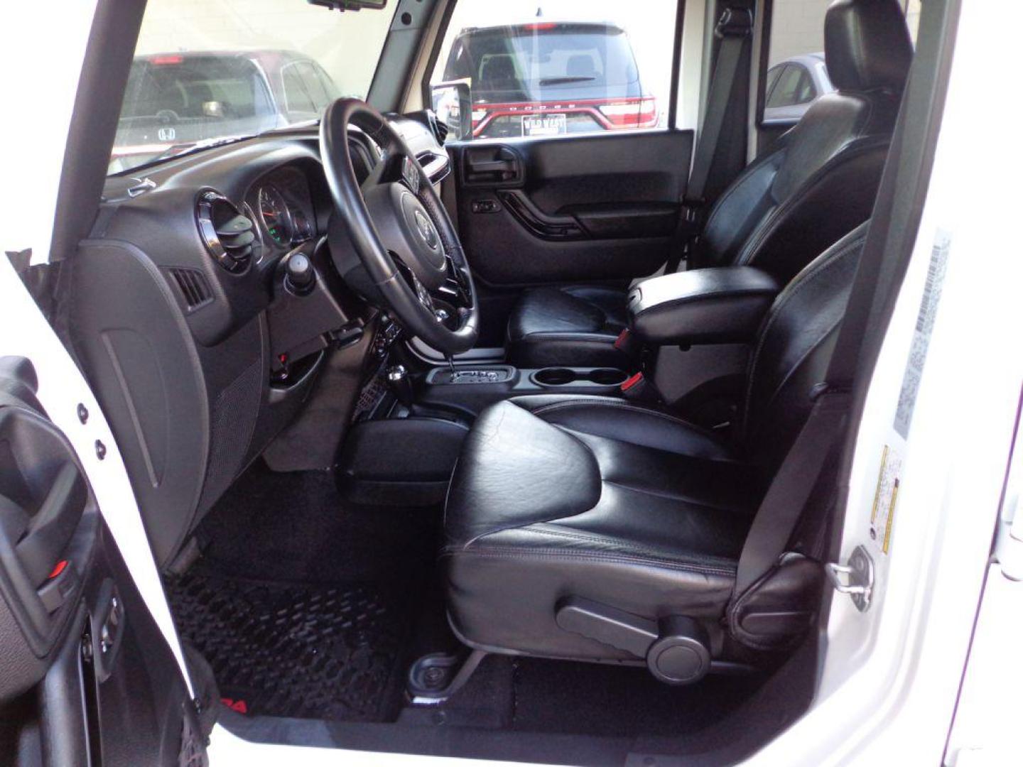 2015 WHITE JEEP WRANGLER UNLIMI SAHARA (1C4BJWEG9FL) with an 3.6L engine, Automatic transmission, located at 6610 L St., Omaha, NE, 68117, (402) 731-7800, 41.212872, -96.014702 - THIS VEHICLE HAS A BEEN FULLY INSPECTED AND HAS A CLEAN TITLE WITH A FREE CARFAX REPORT PROVIDED! 1-OWNER, CLEAN CARFAX, LOW MILEAGE, ALTITUDE PACKAGE WITH SOME NICE ADDED FEATURES AND NEWER TIRES! *****We have found that most customers do the majority of their shopping online before visiting a - Photo#12