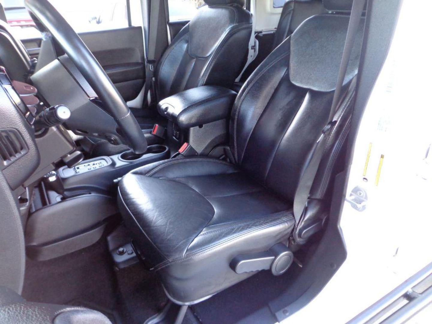 2015 WHITE JEEP WRANGLER UNLIMI SAHARA (1C4BJWEG9FL) with an 3.6L engine, Automatic transmission, located at 6610 L St., Omaha, NE, 68117, (402) 731-7800, 41.212872, -96.014702 - THIS VEHICLE HAS A BEEN FULLY INSPECTED AND HAS A CLEAN TITLE WITH A FREE CARFAX REPORT PROVIDED! 1-OWNER, CLEAN CARFAX, LOW MILEAGE, ALTITUDE PACKAGE WITH SOME NICE ADDED FEATURES AND NEWER TIRES! *****We have found that most customers do the majority of their shopping online before visiting a - Photo#13