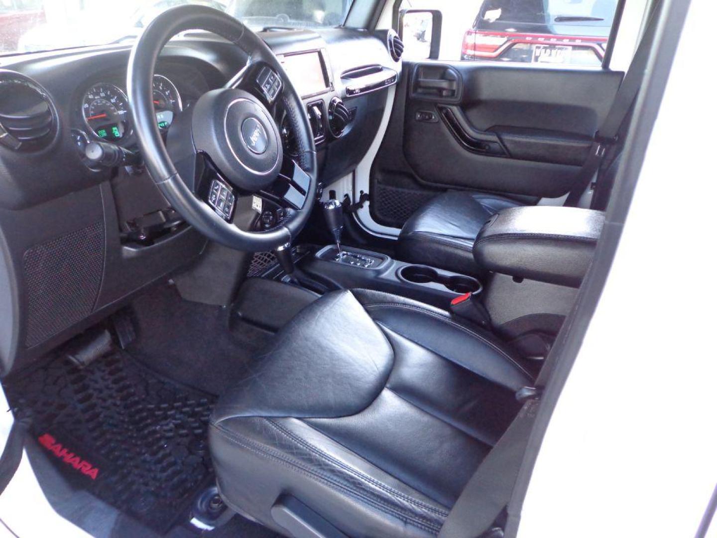 2015 WHITE JEEP WRANGLER UNLIMI SAHARA (1C4BJWEG9FL) with an 3.6L engine, Automatic transmission, located at 6610 L St., Omaha, NE, 68117, (402) 731-7800, 41.212872, -96.014702 - THIS VEHICLE HAS A BEEN FULLY INSPECTED AND HAS A CLEAN TITLE WITH A FREE CARFAX REPORT PROVIDED! 1-OWNER, CLEAN CARFAX, LOW MILEAGE, ALTITUDE PACKAGE WITH SOME NICE ADDED FEATURES AND NEWER TIRES! *****We have found that most customers do the majority of their shopping online before visiting a - Photo#14