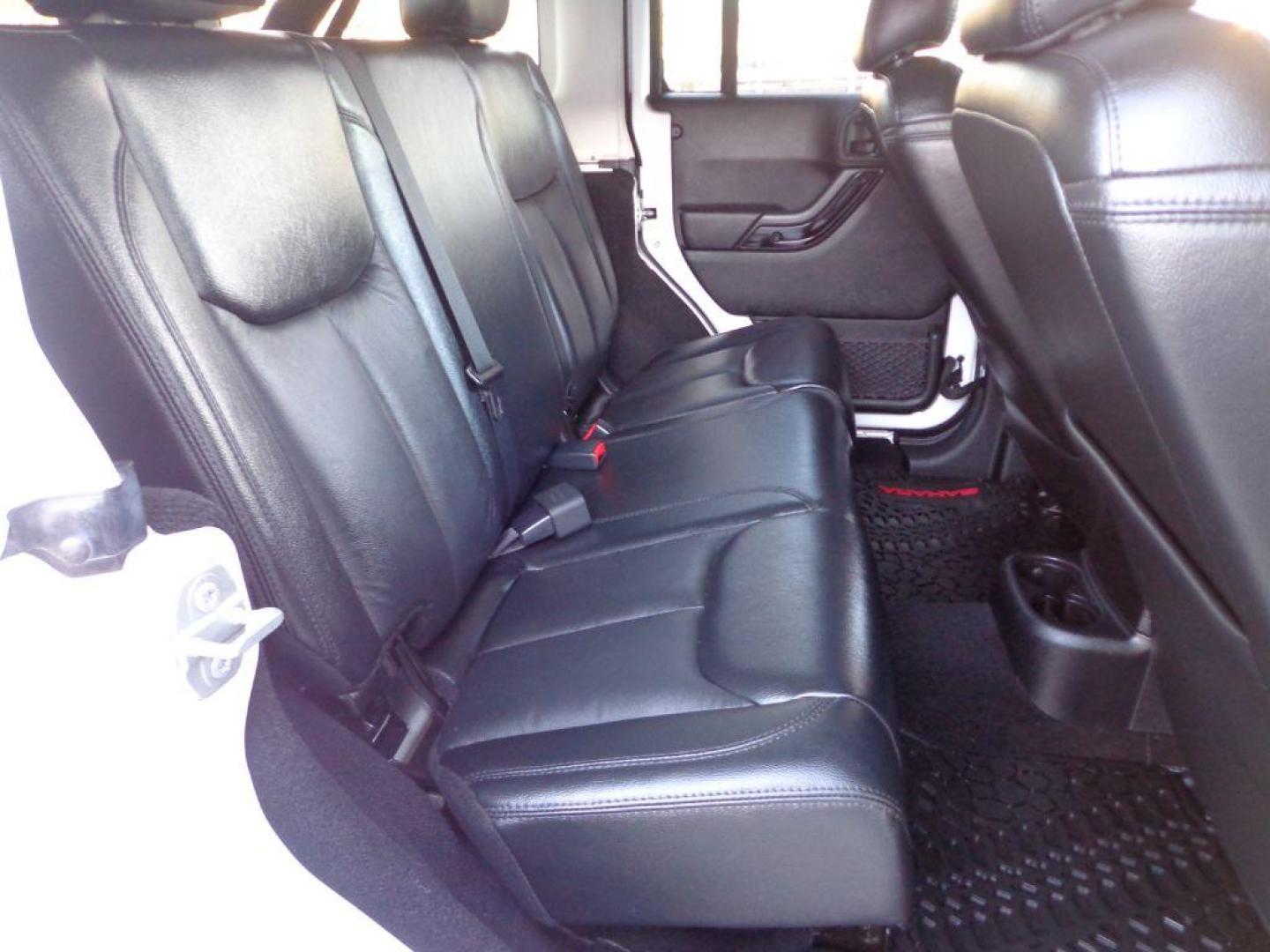 2015 WHITE JEEP WRANGLER UNLIMI SAHARA (1C4BJWEG9FL) with an 3.6L engine, Automatic transmission, located at 6610 L St., Omaha, NE, 68117, (402) 731-7800, 41.212872, -96.014702 - THIS VEHICLE HAS A BEEN FULLY INSPECTED AND HAS A CLEAN TITLE WITH A FREE CARFAX REPORT PROVIDED! 1-OWNER, CLEAN CARFAX, LOW MILEAGE, ALTITUDE PACKAGE WITH SOME NICE ADDED FEATURES AND NEWER TIRES! *****We have found that most customers do the majority of their shopping online before visiting a - Photo#18