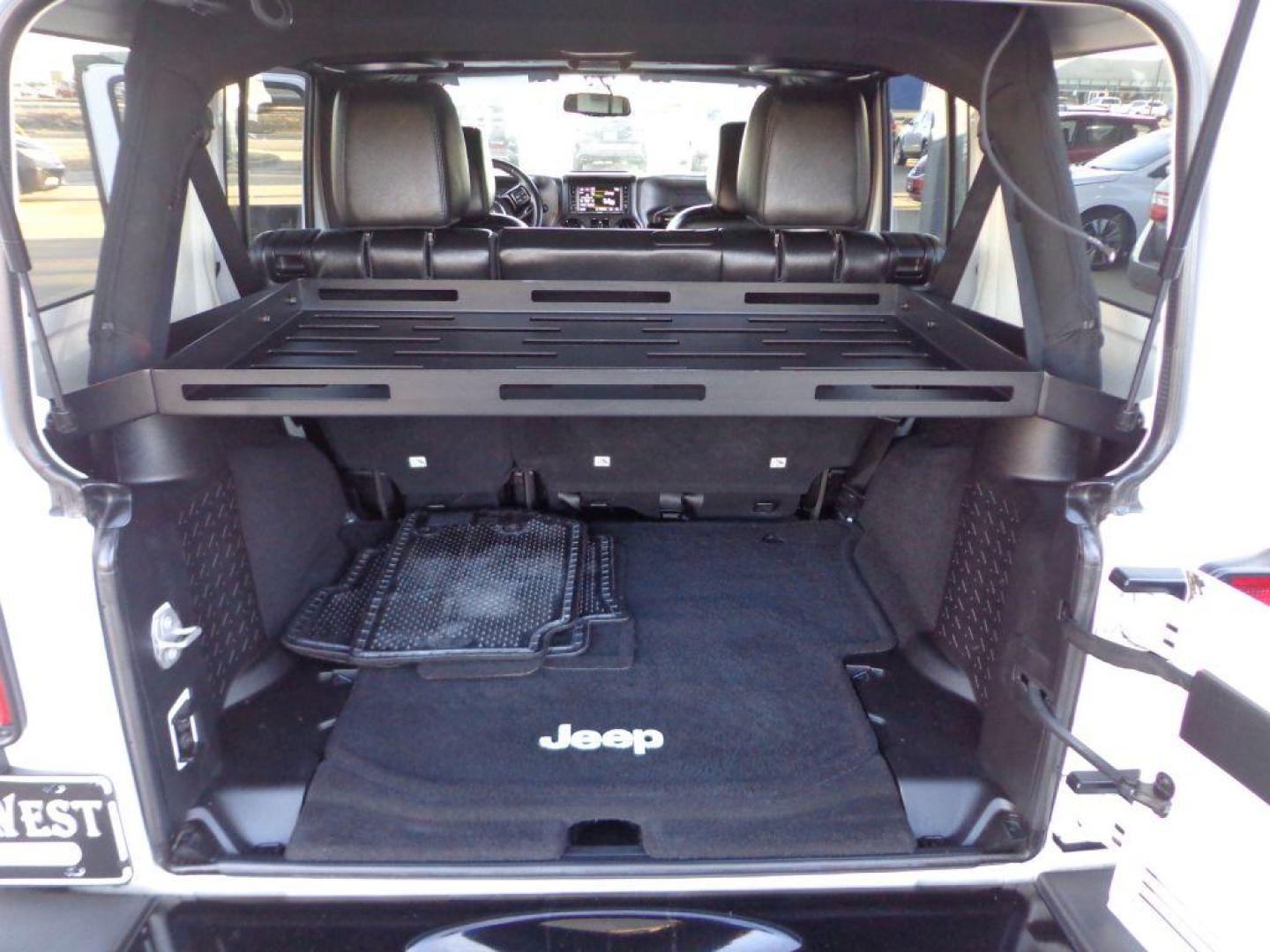 2015 WHITE JEEP WRANGLER UNLIMI SAHARA (1C4BJWEG9FL) with an 3.6L engine, Automatic transmission, located at 6610 L St., Omaha, NE, 68117, (402) 731-7800, 41.212872, -96.014702 - THIS VEHICLE HAS A BEEN FULLY INSPECTED AND HAS A CLEAN TITLE WITH A FREE CARFAX REPORT PROVIDED! 1-OWNER, CLEAN CARFAX, LOW MILEAGE, ALTITUDE PACKAGE WITH SOME NICE ADDED FEATURES AND NEWER TIRES! *****We have found that most customers do the majority of their shopping online before visiting a - Photo#19