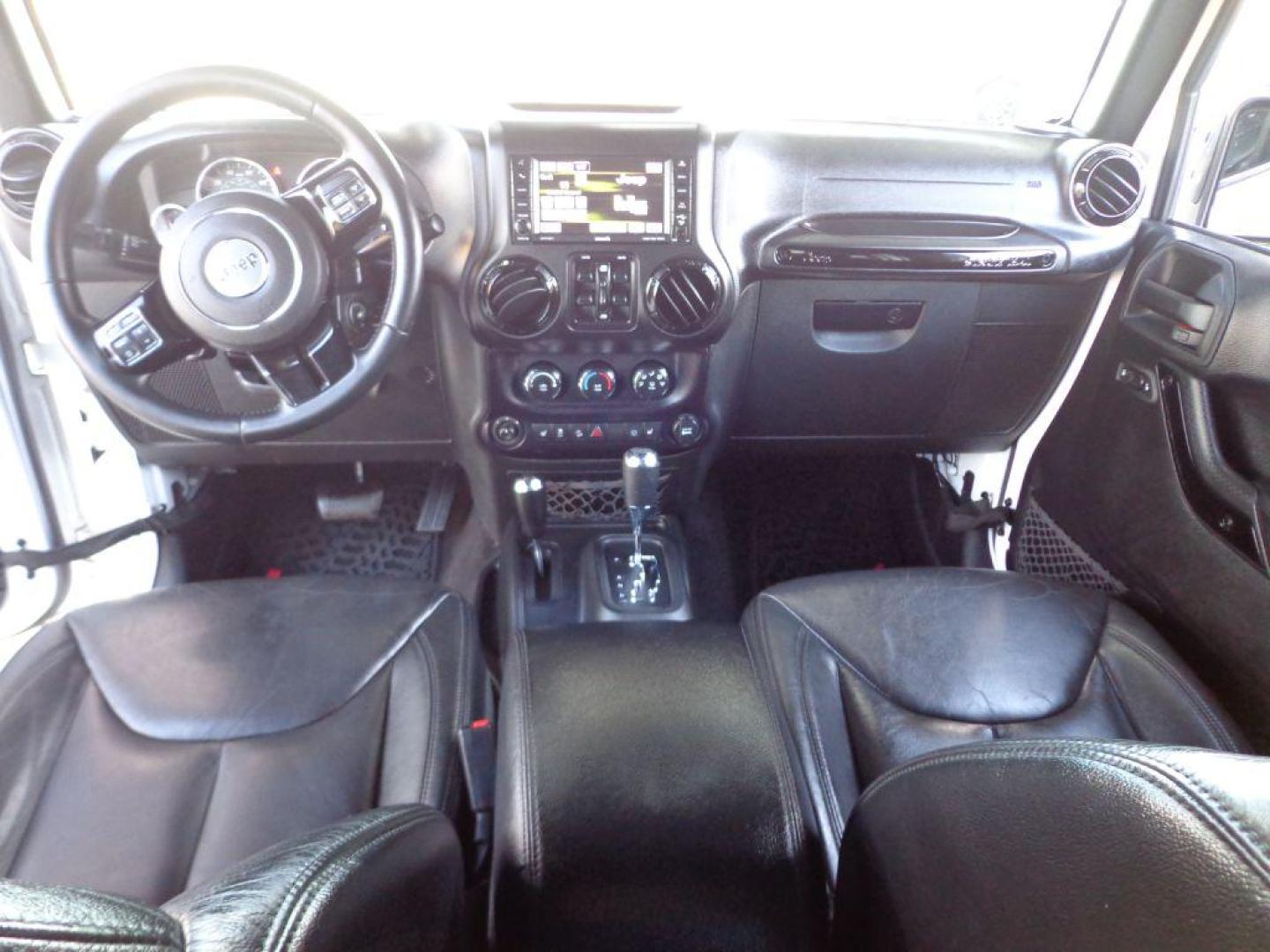 2015 WHITE JEEP WRANGLER UNLIMI SAHARA (1C4BJWEG9FL) with an 3.6L engine, Automatic transmission, located at 6610 L St., Omaha, NE, 68117, (402) 731-7800, 41.212872, -96.014702 - THIS VEHICLE HAS A BEEN FULLY INSPECTED AND HAS A CLEAN TITLE WITH A FREE CARFAX REPORT PROVIDED! 1-OWNER, CLEAN CARFAX, LOW MILEAGE, ALTITUDE PACKAGE WITH SOME NICE ADDED FEATURES AND NEWER TIRES! *****We have found that most customers do the majority of their shopping online before visiting a - Photo#20