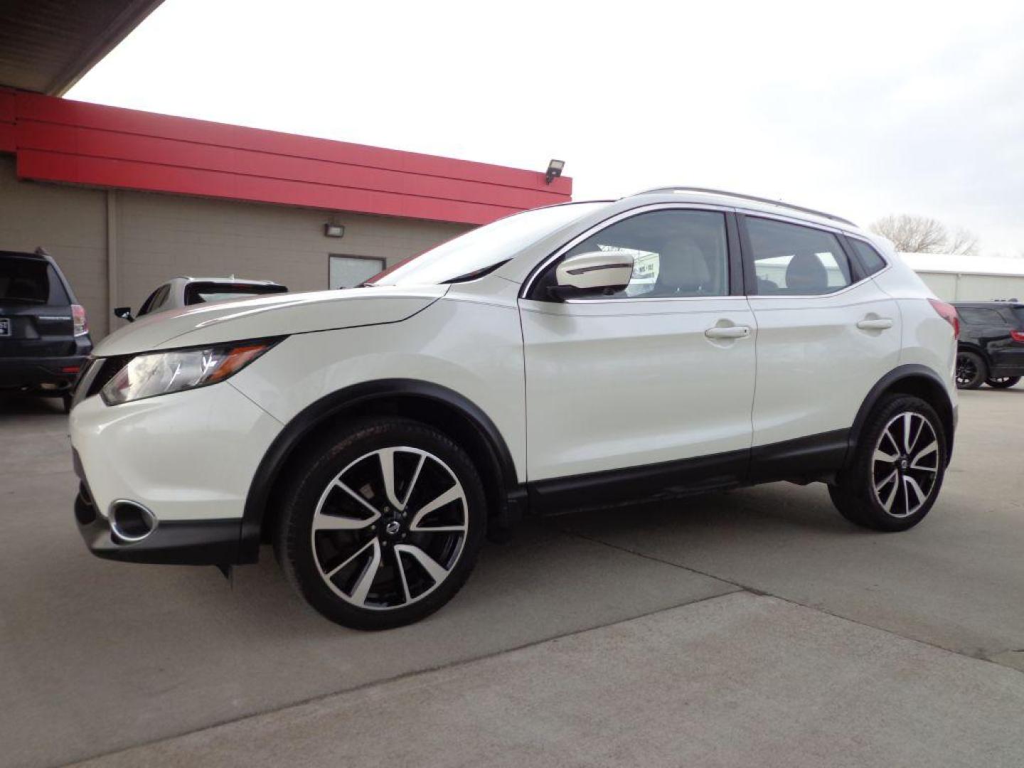 2018 WHITE NISSAN ROGUE SPORT SL (JN1BJ1CRXJW) with an 2.0L engine, Continuously Variable transmission, located at 6610 L St., Omaha, NE, 68117, (402) 731-7800, 41.212872, -96.014702 - THIS VEHICLE HAS A BEEN FULLY INSPECTED AND HAS A CLEAN TITLE WITH A FREE CARFAX REPORT PROVIDED! 1-0WNER, CLEAN CARFAX, LOW MILEAGE,HEATED LEATHER, 360 BACKUP, NAV AND BLIND SPOT ASSIST *****We have found that most customers do the majority of their shopping online before visiting a ealership. - Photo#0