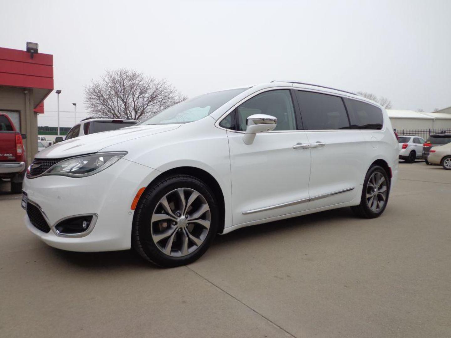 2017 WHITE CHRYSLER PACIFICA LIMITED (2C4RC1GG7HR) with an 3.6L engine, Automatic transmission, located at 6610 L St., Omaha, NE, 68117, (402) 731-7800, 41.212872, -96.014702 - THIS VEHICLE HAS A BEEN FULLY INSPECTED AND HAS A CLEAN TITLE WITH A FREE CARFAX REPORT PROVIDED! SHARP 1-OWNER, CLEAN CARFAX, LOW MILEAGE, PANORAMIC ROOF, 20IN PREMIUM WHEELS, NEWER TIRES, Advanced SafetyTec Group AND Uconnectr Theater Package! *****We have found that most customers do the maj - Photo#0
