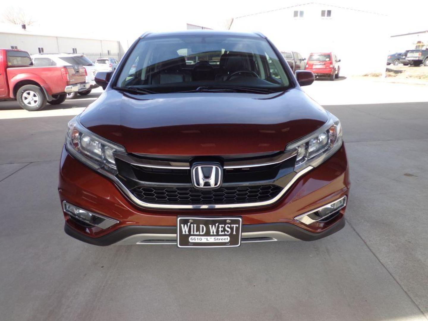 2015 RED HONDA CR-V EXL (2HKRM4H71FH) with an 2.4L engine, Continuously Variable transmission, located at 6610 L St., Omaha, NE, 68117, (402) 731-7800, 41.212872, -96.014702 - THIS VEHICLE HAS A BEEN FULLY INSPECTED AND HAS A CLEAN TITLE WITH A FREE CARFAX REPORT PROVIDED! 1-OWNER, CLEAN CARFAX, LOW MILEAGE, HEATED SEATS, NAV, BACKUP CAM AND NEWER TIRES! *****We have found that most customers do the majority of their shopping online before visiting a ealership. For t - Photo#1