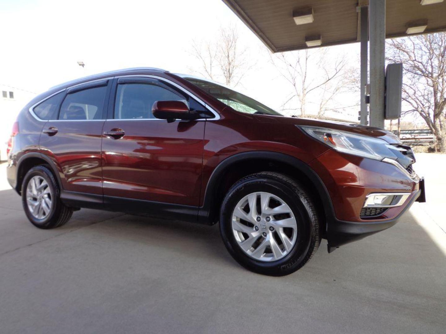 2015 RED HONDA CR-V EXL (2HKRM4H71FH) with an 2.4L engine, Continuously Variable transmission, located at 6610 L St., Omaha, NE, 68117, (402) 731-7800, 41.212872, -96.014702 - THIS VEHICLE HAS A BEEN FULLY INSPECTED AND HAS A CLEAN TITLE WITH A FREE CARFAX REPORT PROVIDED! 1-OWNER, CLEAN CARFAX, LOW MILEAGE, HEATED SEATS, NAV, BACKUP CAM AND NEWER TIRES! *****We have found that most customers do the majority of their shopping online before visiting a ealership. For t - Photo#2