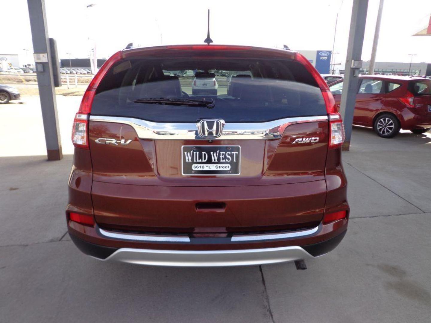 2015 RED HONDA CR-V EXL (2HKRM4H71FH) with an 2.4L engine, Continuously Variable transmission, located at 6610 L St., Omaha, NE, 68117, (402) 731-7800, 41.212872, -96.014702 - THIS VEHICLE HAS A BEEN FULLY INSPECTED AND HAS A CLEAN TITLE WITH A FREE CARFAX REPORT PROVIDED! 1-OWNER, CLEAN CARFAX, LOW MILEAGE, HEATED SEATS, NAV, BACKUP CAM AND NEWER TIRES! *****We have found that most customers do the majority of their shopping online before visiting a ealership. For t - Photo#4