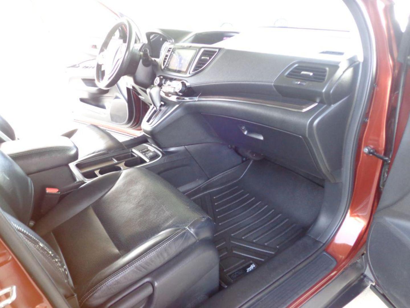 2015 RED HONDA CR-V EXL (2HKRM4H71FH) with an 2.4L engine, Continuously Variable transmission, located at 6610 L St., Omaha, NE, 68117, (402) 731-7800, 41.212872, -96.014702 - THIS VEHICLE HAS A BEEN FULLY INSPECTED AND HAS A CLEAN TITLE WITH A FREE CARFAX REPORT PROVIDED! 1-OWNER, CLEAN CARFAX, LOW MILEAGE, HEATED SEATS, NAV, BACKUP CAM AND NEWER TIRES! *****We have found that most customers do the majority of their shopping online before visiting a ealership. For t - Photo#16