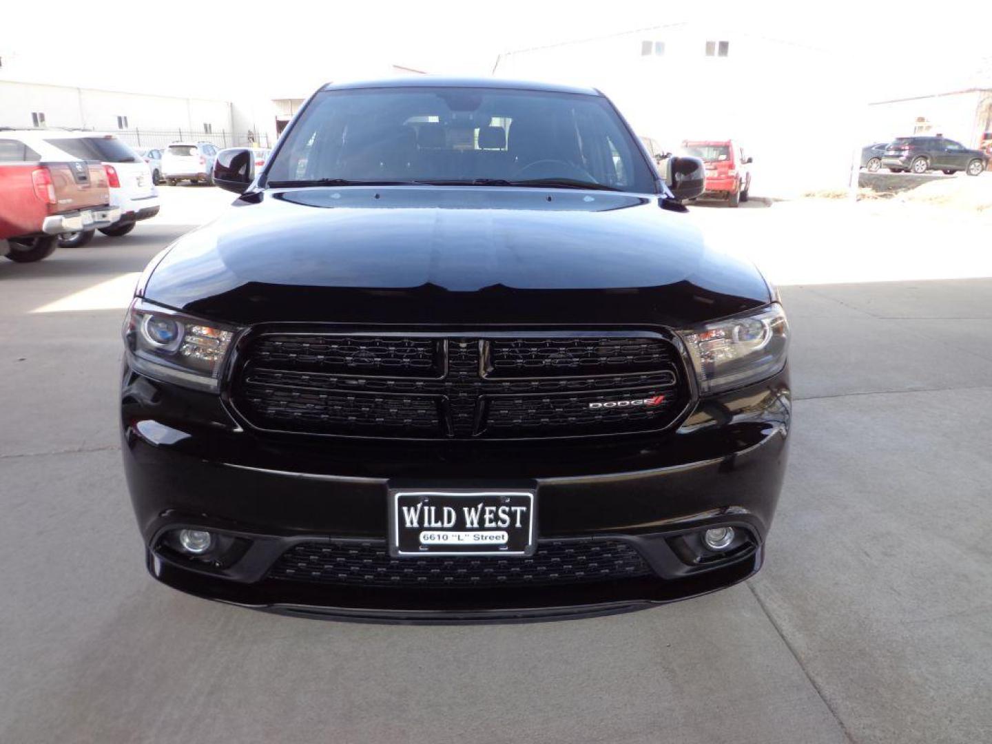2019 BLACK DODGE DURANGO SXT PLUS (1C4RDJAG5KC) with an 3.6L engine, Automatic transmission, located at 6610 L St., Omaha, NE, 68117, (402) 731-7800, 41.212872, -96.014702 - THIS VEHICLE HAS A BEEN FULLY INSPECTED AND HAS A CLEAN TITLE WITH A FREE CARFAX REPORT PROVIDED! 1-OWNER, CLEAN CARFAX, LOW MILEAGE, BLACKTOP PACKAGE, 2ND ROW CAPTAINS, SUNROOF, BLIND SPOT AND CROSS PATH DETECTION, PARK ASSISTAND NEWER TIRES! *****We have found that most customers do the major - Photo#1
