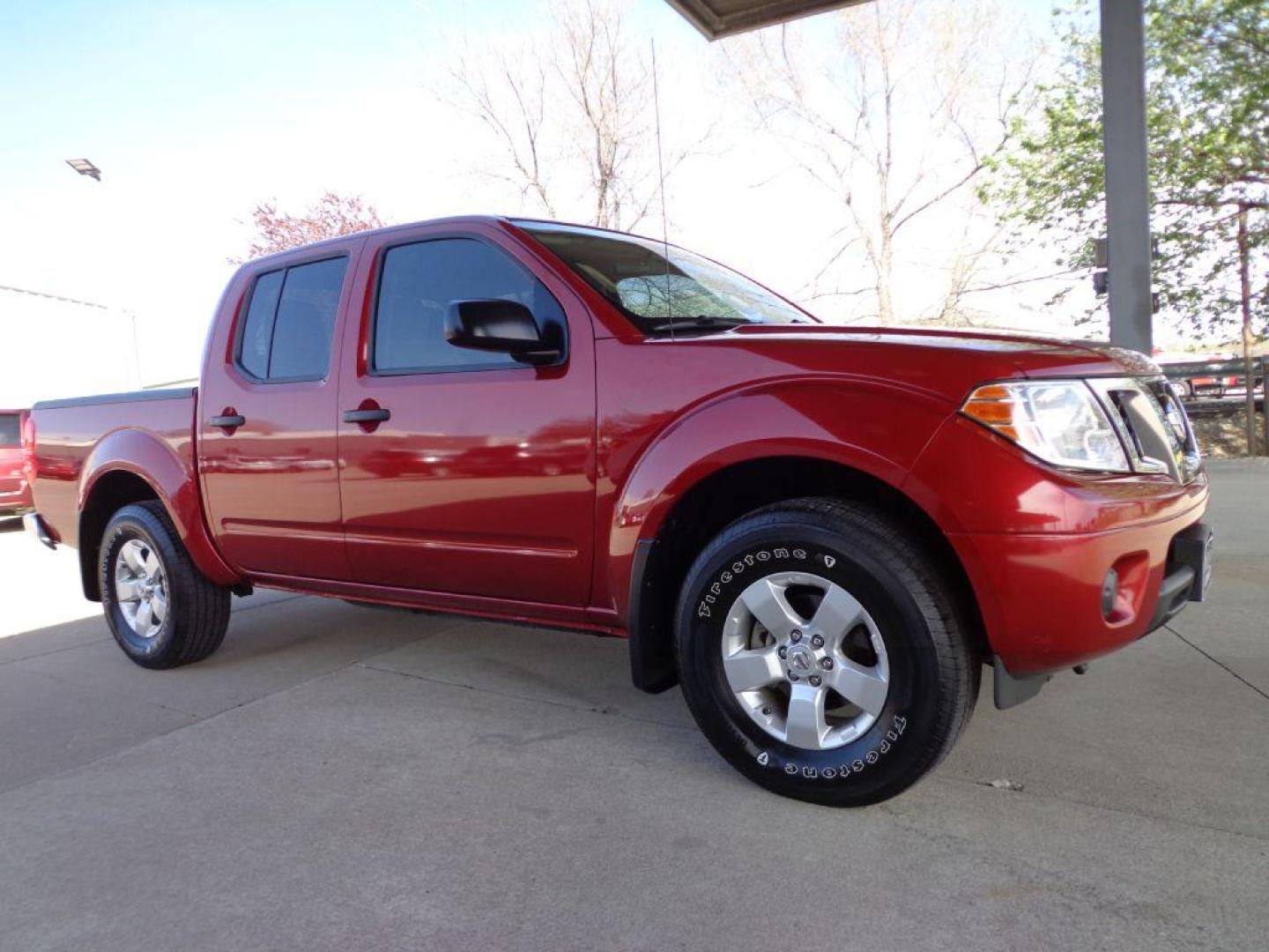 2012 RED NISSAN FRONTIER SV (1N6AD0EV5CC) with an 4.0L engine, Automatic transmission, located at 6610 L St., Omaha, NE, 68117, (402) 731-7800, 41.212872, -96.014702 - THIS VEHICLE HAS A BEEN FULLY INSPECTED AND HAS A CLEAN TITLE WITH A FREE CARFAX REPORT PROVIDED! SHARP TRUCK WITH LOW MILEAGE! *****We have found that most customers do the majority of their shopping online before visiting a ealership. For this reason we feel it necessary to have a competitive - Photo#2