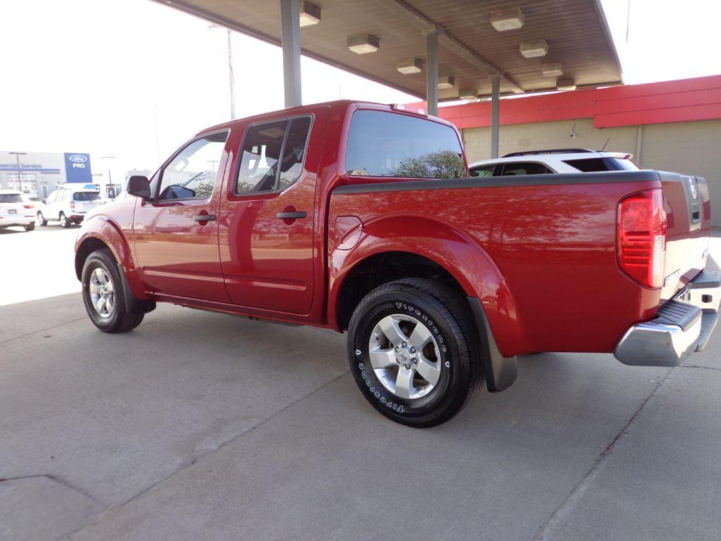 2012 RED NISSAN FRONTIER SV (1N6AD0EV5CC) with an 4.0L engine, Automatic transmission, located at 6610 L St., Omaha, NE, 68117, (402) 731-7800, 41.212872, -96.014702 - THIS VEHICLE HAS A BEEN FULLY INSPECTED AND HAS A CLEAN TITLE WITH A FREE CARFAX REPORT PROVIDED! SHARP TRUCK WITH LOW MILEAGE! *****We have found that most customers do the majority of their shopping online before visiting a ealership. For this reason we feel it necessary to have a competitive - Photo#4