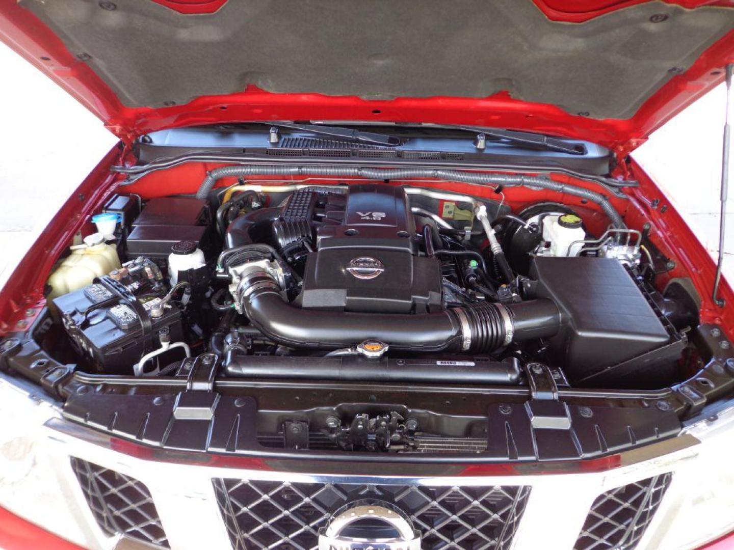 2012 RED NISSAN FRONTIER SV (1N6AD0EV5CC) with an 4.0L engine, Automatic transmission, located at 6610 L St., Omaha, NE, 68117, (402) 731-7800, 41.212872, -96.014702 - THIS VEHICLE HAS A BEEN FULLY INSPECTED AND HAS A CLEAN TITLE WITH A FREE CARFAX REPORT PROVIDED! SHARP TRUCK WITH LOW MILEAGE! *****We have found that most customers do the majority of their shopping online before visiting a ealership. For this reason we feel it necessary to have a competitive - Photo#10