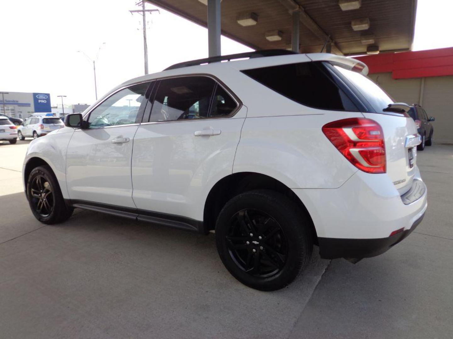 2017 WHITE CHEVROLET EQUINOX LT (2GNFLFEK8H6) with an 2.4L engine, Automatic transmission, located at 6610 L St., Omaha, NE, 68117, (402) 731-7800, 41.212872, -96.014702 - THIS VEHICLE HAS A BEEN FULLY INSPECTED AND HAS A CLEAN TITLE WITH A FREE CARFAX REPORT PROVIDED! 2-OWNER, CLEAN CARFAX, LOW MILEAGE, SUNROOF, HEATED LEATHER, NEWER TIRES AND MUCH MORE! *****We have found that most customers do the majority of their shopping online before visiting a ealership. - Photo#5