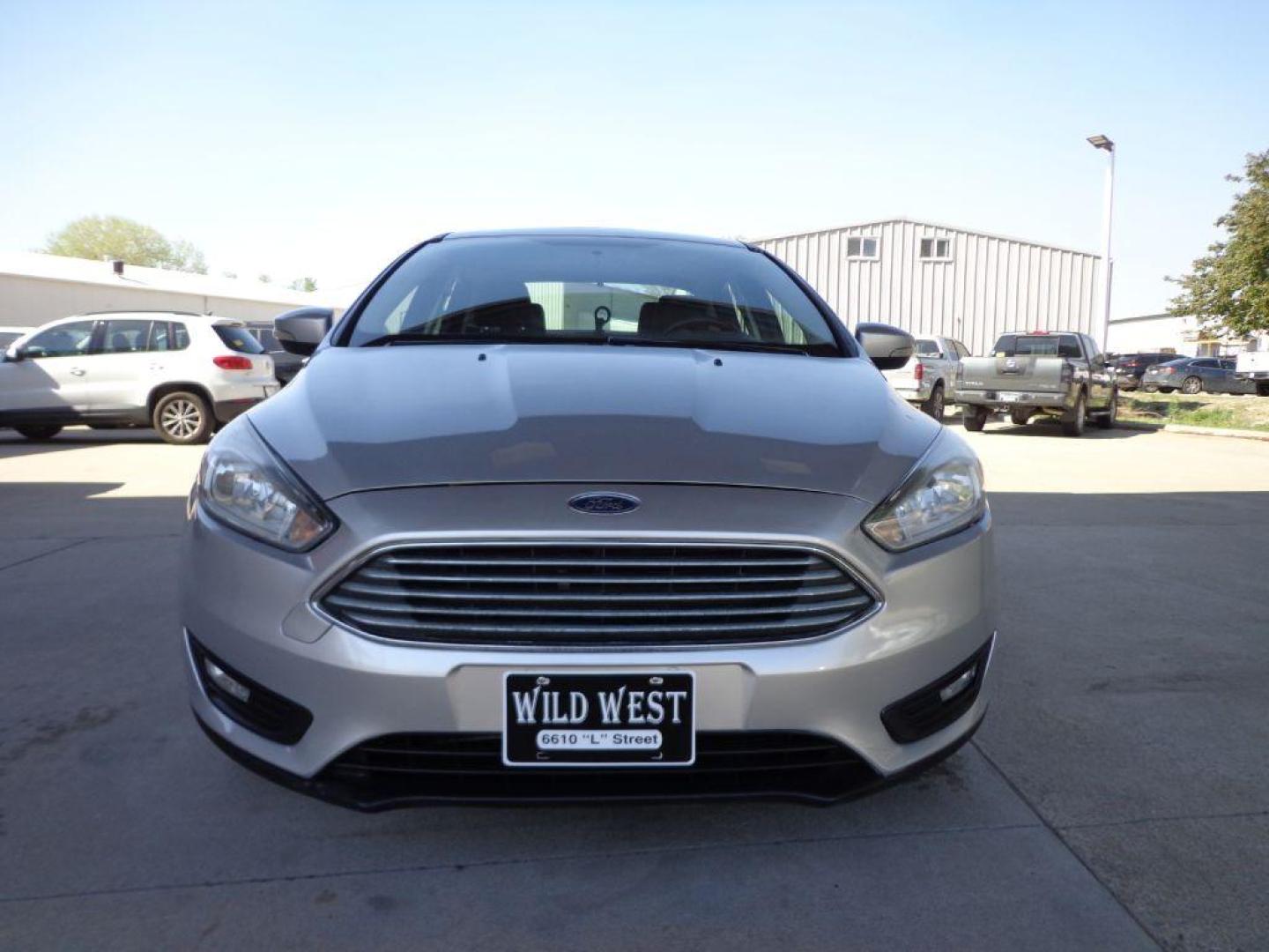 2018 SILVER FORD FOCUS SEL (1FADP3H21JL) with an 2.0L engine, Automatic transmission, located at 6610 L St., Omaha, NE, 68117, (402) 731-7800, 41.212872, -96.014702 - TRADE -IN WITH A SALVAGE TITLE. RUNS AND DRIVES GOOD WITH NEWER TIRES! *****We have found that most customers do the majority of their shopping online before visiting a ealership. For this reason we feel it necessary to have a competitive price on our used vehicles right up front. We spend time - Photo#1