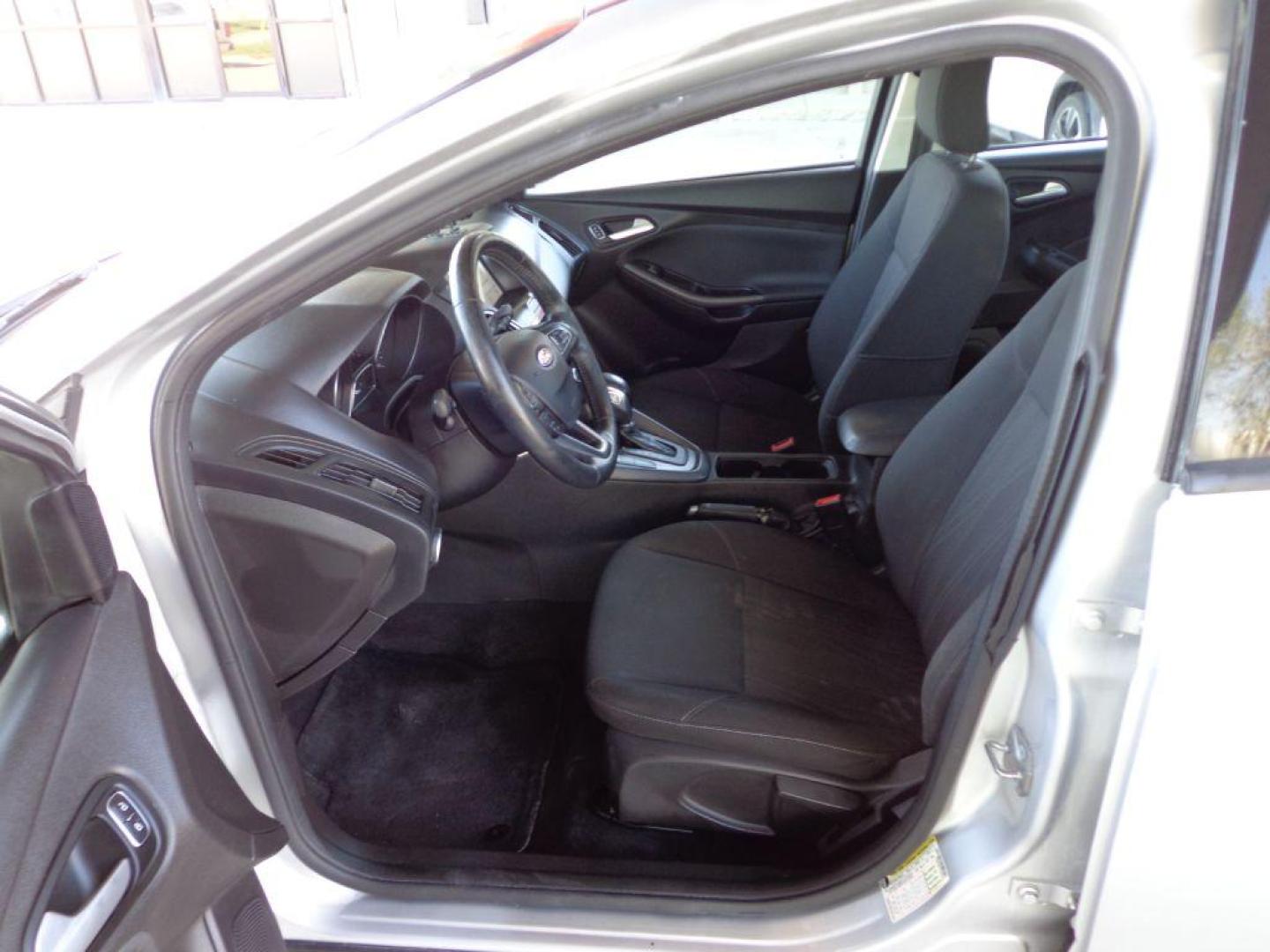 2018 SILVER FORD FOCUS SEL (1FADP3H21JL) with an 2.0L engine, Automatic transmission, located at 6610 L St., Omaha, NE, 68117, (402) 731-7800, 41.212872, -96.014702 - TRADE -IN WITH A SALVAGE TITLE. RUNS AND DRIVES GOOD WITH NEWER TIRES! *****We have found that most customers do the majority of their shopping online before visiting a ealership. For this reason we feel it necessary to have a competitive price on our used vehicles right up front. We spend time - Photo#12