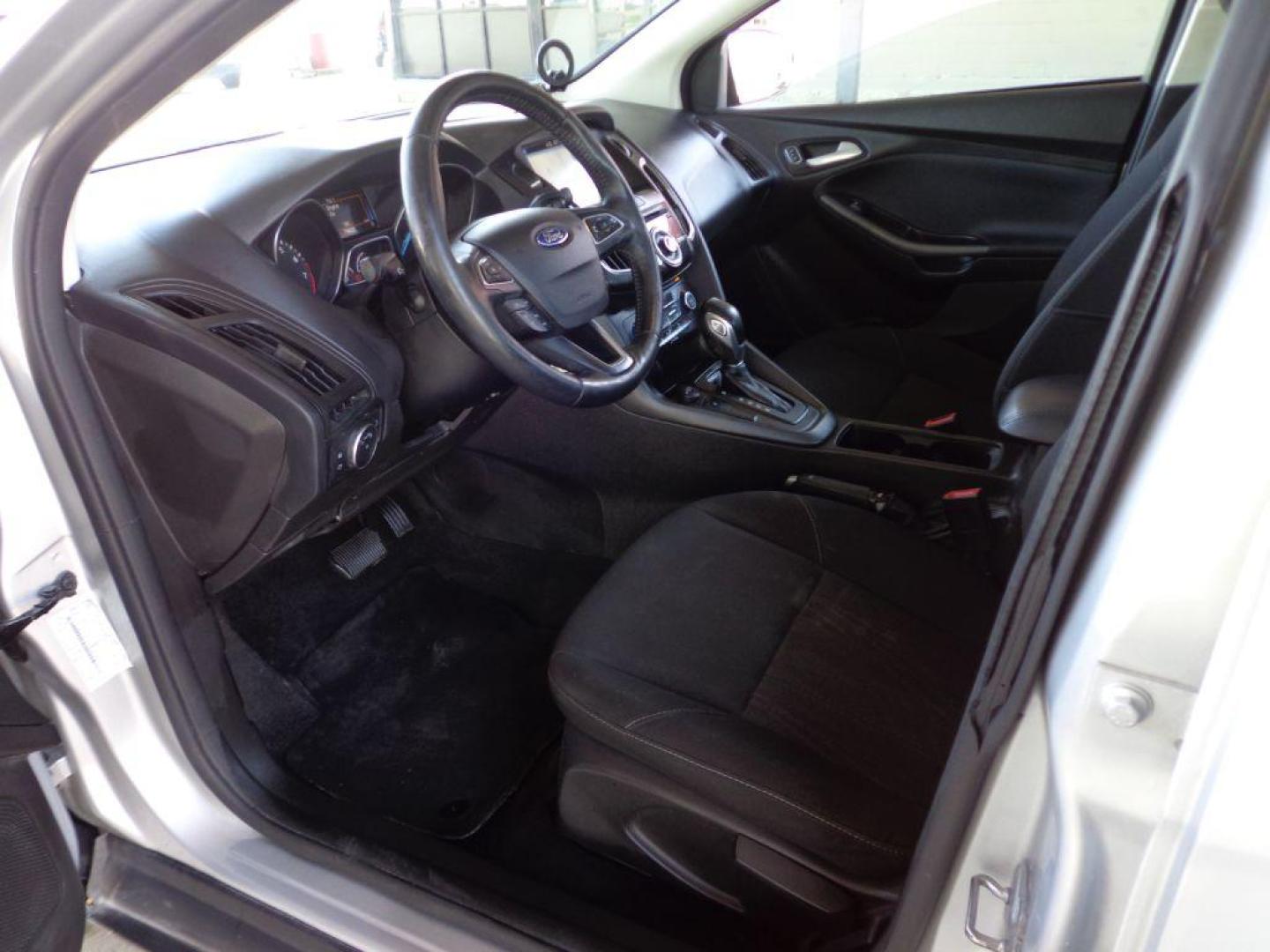 2018 SILVER FORD FOCUS SEL (1FADP3H21JL) with an 2.0L engine, Automatic transmission, located at 6610 L St., Omaha, NE, 68117, (402) 731-7800, 41.212872, -96.014702 - TRADE -IN WITH A SALVAGE TITLE. RUNS AND DRIVES GOOD WITH NEWER TIRES! *****We have found that most customers do the majority of their shopping online before visiting a ealership. For this reason we feel it necessary to have a competitive price on our used vehicles right up front. We spend time - Photo#14