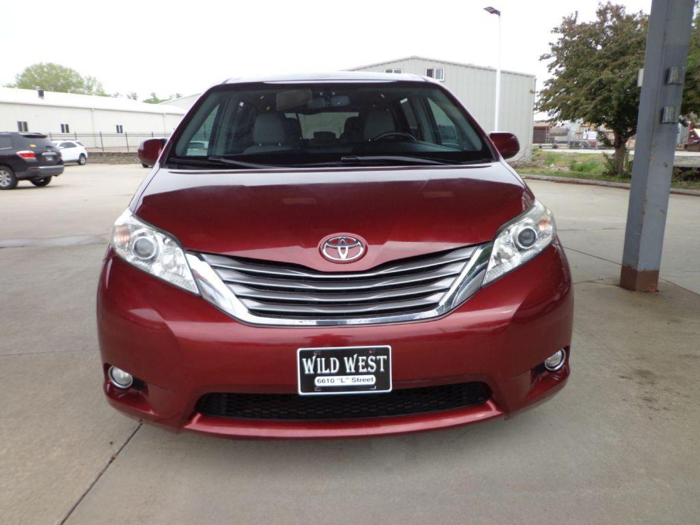 2015 RED TOYOTA SIENNA XLE (5TDYK3DC2FS) with an 3.5L engine, Automatic transmission, located at 6610 L St., Omaha, NE, 68117, (402) 731-7800, 41.212872, -96.014702 - THIS VEHICLE HAS A BEEN FULLY INSPECTED AND HAS A CLEAN TITLE WITH A FREE CARFAX REPORT CLEAN CARFAX, LOW MILEAGE, SUNROOF *****We have found that most customers do the majority of their shopping online before visiting a ealership. For this reason we feel it necessary to have a competitive pri - Photo#1