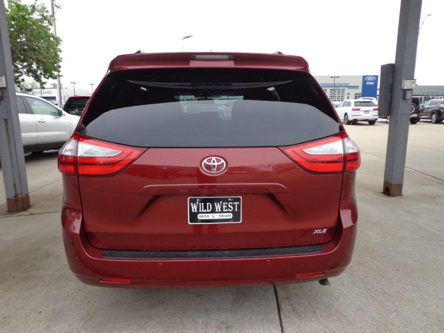 2015 RED TOYOTA SIENNA XLE (5TDYK3DC2FS) with an 3.5L engine, Automatic transmission, located at 6610 L St., Omaha, NE, 68117, (402) 731-7800, 41.212872, -96.014702 - THIS VEHICLE HAS A BEEN FULLY INSPECTED AND HAS A CLEAN TITLE WITH A FREE CARFAX REPORT CLEAN CARFAX, LOW MILEAGE, SUNROOF *****We have found that most customers do the majority of their shopping online before visiting a ealership. For this reason we feel it necessary to have a competitive pri - Photo#4