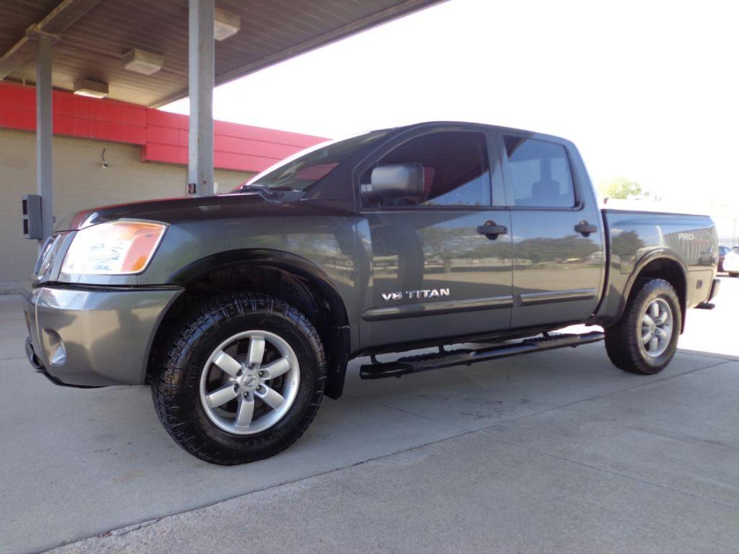 2011 GRAY NISSAN TITAN PRO-4X (1N6BA0EC9BN) with an 5.6L engine, Automatic transmission, located at 6610 L St., Omaha, NE, 68117, (402) 731-7800, 41.212872, -96.014702 - THIS VEHICLE HAS A BEEN FULLY INSPECTED AND HAS A CLEAN TITLE WITH A FREE CARFAX REPORT PROVIDED! SHARP RUST-FREE TITAN WITH LOW MILEAGE AND NEWER TIRES *****We have found that most customers do the majority of their shopping online before visiting a ealership. For this reason we feel it necess - Photo#0