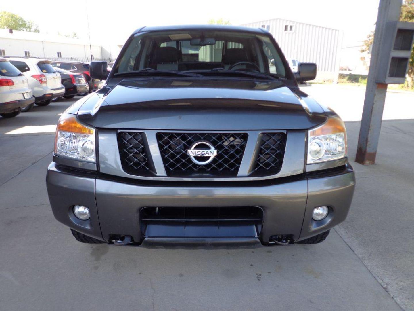 2011 GRAY NISSAN TITAN PRO-4X (1N6BA0EC9BN) with an 5.6L engine, Automatic transmission, located at 6610 L St., Omaha, NE, 68117, (402) 731-7800, 41.212872, -96.014702 - THIS VEHICLE HAS A BEEN FULLY INSPECTED AND HAS A CLEAN TITLE WITH A FREE CARFAX REPORT PROVIDED! SHARP RUST-FREE TITAN WITH LOW MILEAGE AND NEWER TIRES *****We have found that most customers do the majority of their shopping online before visiting a ealership. For this reason we feel it necess - Photo#1