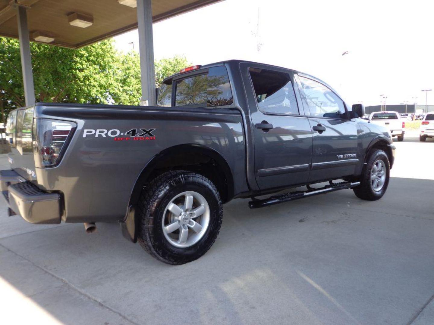 2011 GRAY NISSAN TITAN PRO-4X (1N6BA0EC9BN) with an 5.6L engine, Automatic transmission, located at 6610 L St., Omaha, NE, 68117, (402) 731-7800, 41.212872, -96.014702 - THIS VEHICLE HAS A BEEN FULLY INSPECTED AND HAS A CLEAN TITLE WITH A FREE CARFAX REPORT PROVIDED! SHARP RUST-FREE TITAN WITH LOW MILEAGE AND NEWER TIRES *****We have found that most customers do the majority of their shopping online before visiting a ealership. For this reason we feel it necess - Photo#3