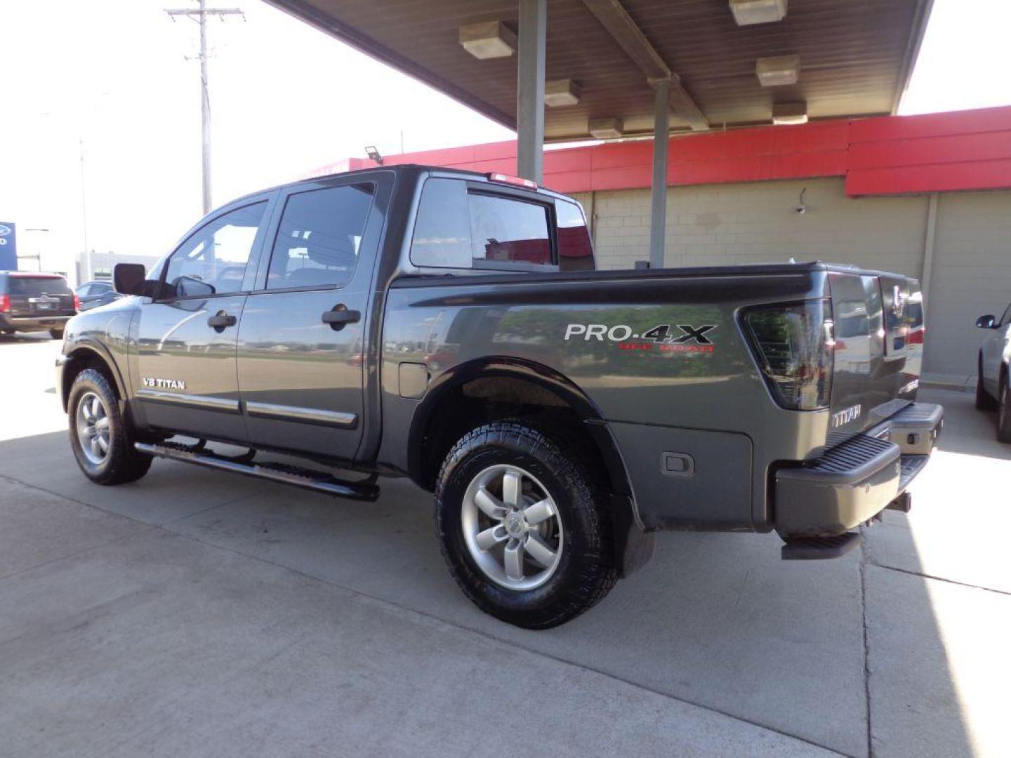 2011 GRAY NISSAN TITAN PRO-4X (1N6BA0EC9BN) with an 5.6L engine, Automatic transmission, located at 6610 L St., Omaha, NE, 68117, (402) 731-7800, 41.212872, -96.014702 - THIS VEHICLE HAS A BEEN FULLY INSPECTED AND HAS A CLEAN TITLE WITH A FREE CARFAX REPORT PROVIDED! SHARP RUST-FREE TITAN WITH LOW MILEAGE AND NEWER TIRES *****We have found that most customers do the majority of their shopping online before visiting a ealership. For this reason we feel it necess - Photo#5