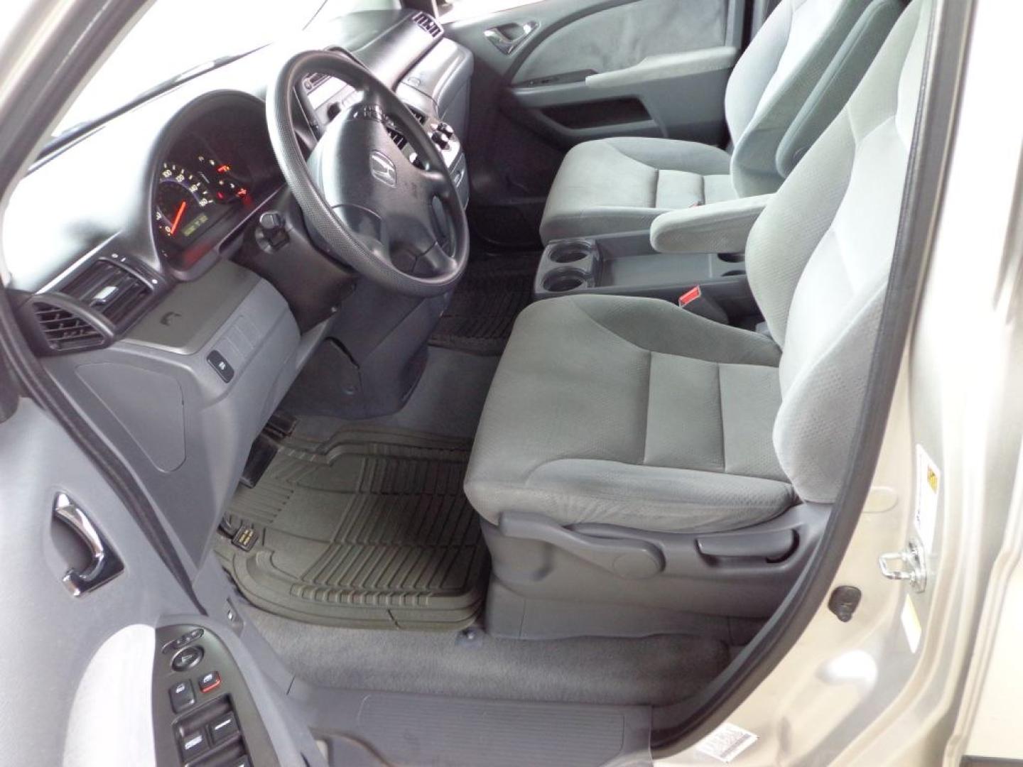 2007 SILVER HONDA ODYSSEY LX (5FNRL38257B) with an 3.5L engine, Automatic transmission, located at 6610 L St., Omaha, NE, 68117, (402) 731-7800, 41.212872, -96.014702 - THIS VEHICLE HAS A BEEN FULLY INSPECTED AND HAS A CLEAN TITLE WITH A FREE CARFAX REPORT PROVIDED! FRESH TRADE-IN. WELL CARED FOR VAN WITH A CLEAN CARFAX. *****We have found that most customers do the majority of their shopping online before visiting a ealership. For this reason we feel it nece- Photo#8