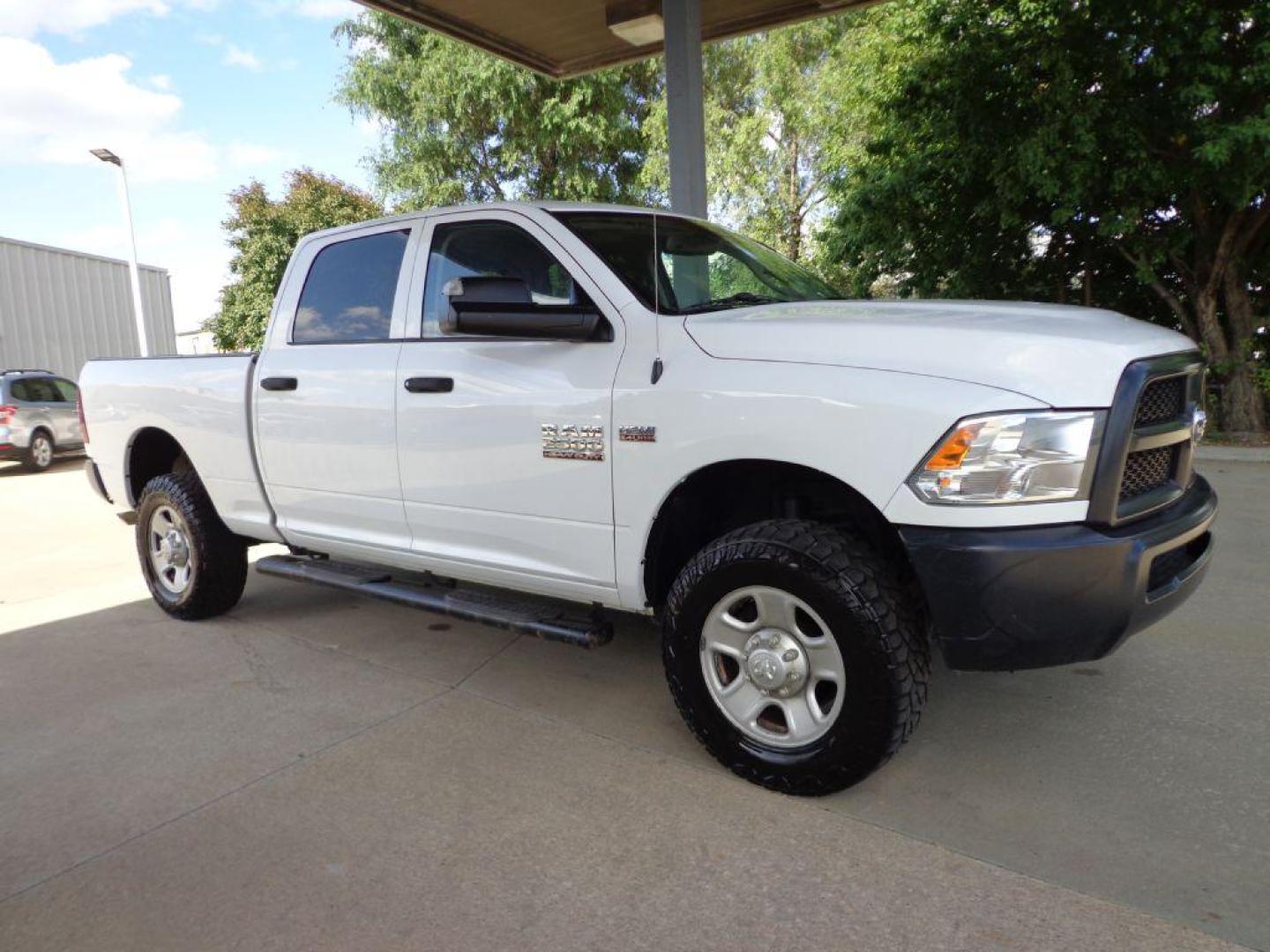 2018 WHITE RAM 2500 TRADESMAN (3C6UR5CJ9JG) with an 6.4L engine, Automatic transmission, located at 6610 L St., Omaha, NE, 68117, (402) 731-7800, 41.212872, -96.014702 - THIS VEHICLE HAS A BEEN FULLY INSPECTED AND HAS A CLEAN TITLE WITH A FREE CARFAX REPORT PROVIDED! 1-OWNER, CLEAN CARFAX, LOW MILEAGE, BACKUP CAM AND NEWER TIRES! *****We have found that most customers do the majority of their shopping online before visiting a ealership. For this reason we feel - Photo#2