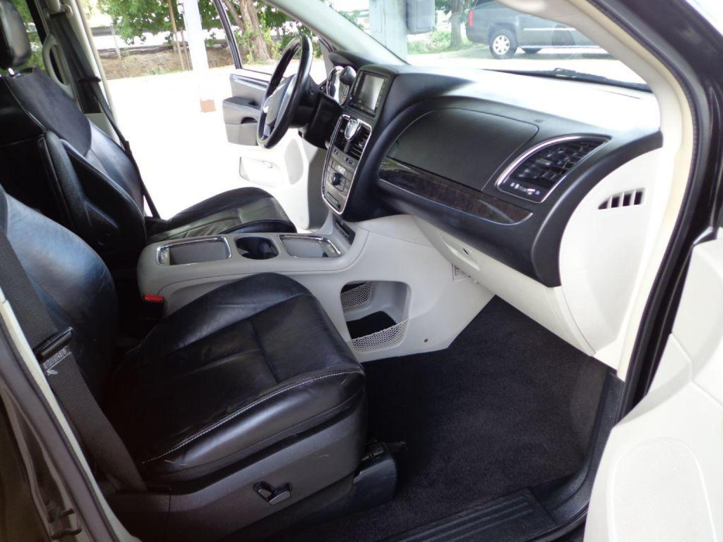 2015 BLACK CHRYSLER TOWN and COUNTRY LIMITED PLATINUM (2C4RC1GG8FR) with an 3.6L engine, Automatic transmission, located at 6610 L St., Omaha, NE, 68117, (402) 731-7800, 41.212872, -96.014702 - THIS VEHICLE HAS A BEEN FULLY INSPECTED AND HAS A CLEAN TITLE WITH A FREE CARFAX REPORT PROVIDED! 2-OWNER, CLEN CARFAX, LOW MILEAGE, LOADED WITH OPTIONS AND NEWER TIRES! *****We have found that most customers do the majority of their shopping online before visiting a ealership. For this reason - Photo#16