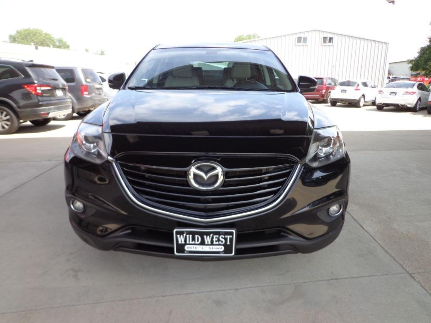 2014 BLACK MAZDA CX-9 GRAND TOURING (JM3TB3DV2E0) with an 3.7L engine, Automatic transmission, located at 6610 L St., Omaha, NE, 68117, (402) 731-7800, 41.212872, -96.014702 - THIS VEHICLE HAS A BEEN FULLY INSPECTED AND HAS A CLEAN TITLE WITH A FREE CARFAX REPORT PROVIDED! 2-OWNER, CLEAN CARFAX, LOW MILEAGE, LOADED WITH OPTIONS AND NEWER TIRES! *****We have found that most customers do the majority of their shopping online before visiting a ealership. For this reason- Photo#1
