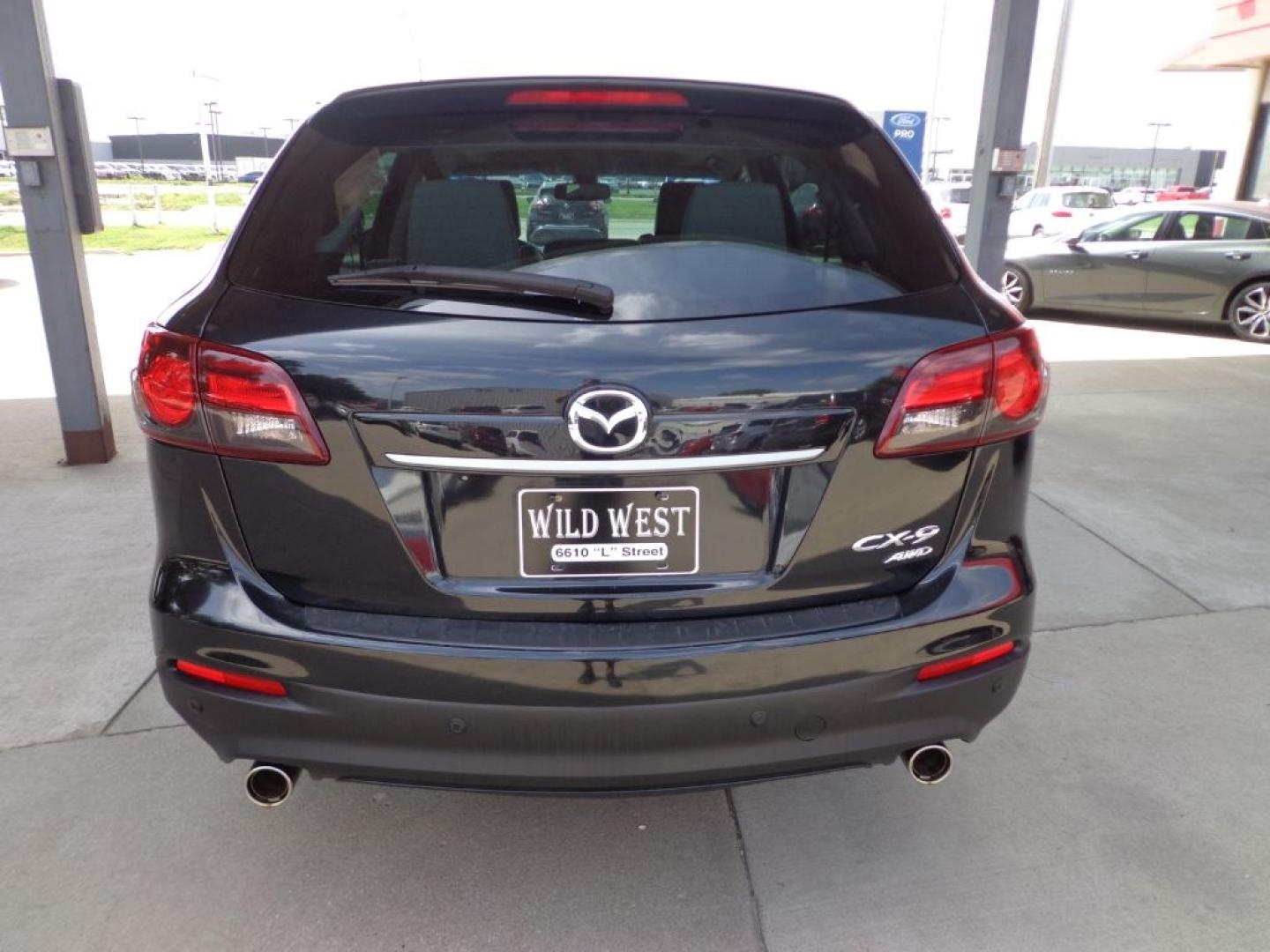2014 BLACK MAZDA CX-9 GRAND TOURING (JM3TB3DV2E0) with an 3.7L engine, Automatic transmission, located at 6610 L St., Omaha, NE, 68117, (402) 731-7800, 41.212872, -96.014702 - THIS VEHICLE HAS A BEEN FULLY INSPECTED AND HAS A CLEAN TITLE WITH A FREE CARFAX REPORT PROVIDED! 2-OWNER, CLEAN CARFAX, LOW MILEAGE, LOADED WITH OPTIONS AND NEWER TIRES! *****We have found that most customers do the majority of their shopping online before visiting a ealership. For this reason- Photo#4