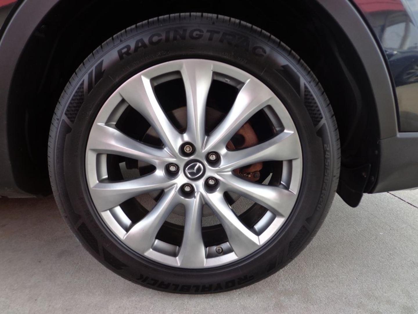 2014 BLACK MAZDA CX-9 GRAND TOURING (JM3TB3DV2E0) with an 3.7L engine, Automatic transmission, located at 6610 L St., Omaha, NE, 68117, (402) 731-7800, 41.212872, -96.014702 - THIS VEHICLE HAS A BEEN FULLY INSPECTED AND HAS A CLEAN TITLE WITH A FREE CARFAX REPORT PROVIDED! 2-OWNER, CLEAN CARFAX, LOW MILEAGE, LOADED WITH OPTIONS AND NEWER TIRES! *****We have found that most customers do the majority of their shopping online before visiting a ealership. For this reason- Photo#8