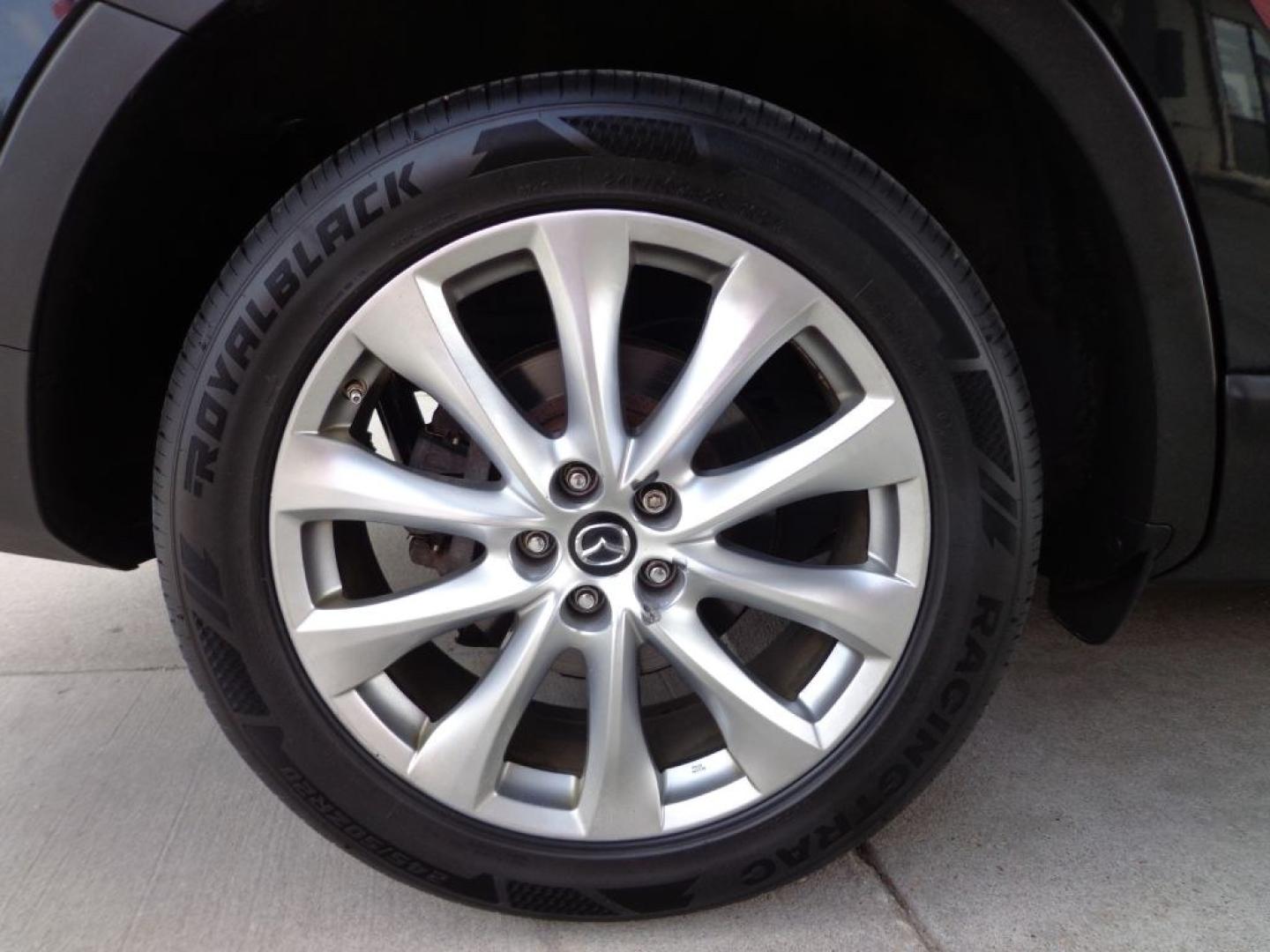 2014 BLACK MAZDA CX-9 GRAND TOURING (JM3TB3DV2E0) with an 3.7L engine, Automatic transmission, located at 6610 L St., Omaha, NE, 68117, (402) 731-7800, 41.212872, -96.014702 - THIS VEHICLE HAS A BEEN FULLY INSPECTED AND HAS A CLEAN TITLE WITH A FREE CARFAX REPORT PROVIDED! 2-OWNER, CLEAN CARFAX, LOW MILEAGE, LOADED WITH OPTIONS AND NEWER TIRES! *****We have found that most customers do the majority of their shopping online before visiting a ealership. For this reason- Photo#9