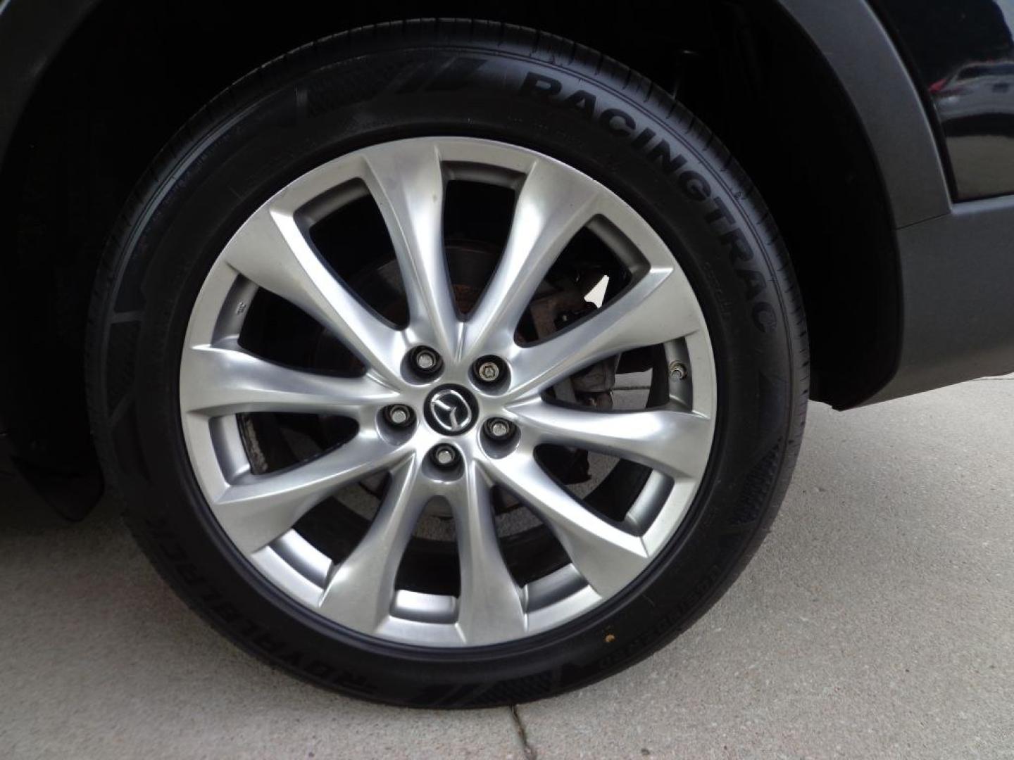 2014 BLACK MAZDA CX-9 GRAND TOURING (JM3TB3DV2E0) with an 3.7L engine, Automatic transmission, located at 6610 L St., Omaha, NE, 68117, (402) 731-7800, 41.212872, -96.014702 - THIS VEHICLE HAS A BEEN FULLY INSPECTED AND HAS A CLEAN TITLE WITH A FREE CARFAX REPORT PROVIDED! 2-OWNER, CLEAN CARFAX, LOW MILEAGE, LOADED WITH OPTIONS AND NEWER TIRES! *****We have found that most customers do the majority of their shopping online before visiting a ealership. For this reason- Photo#10