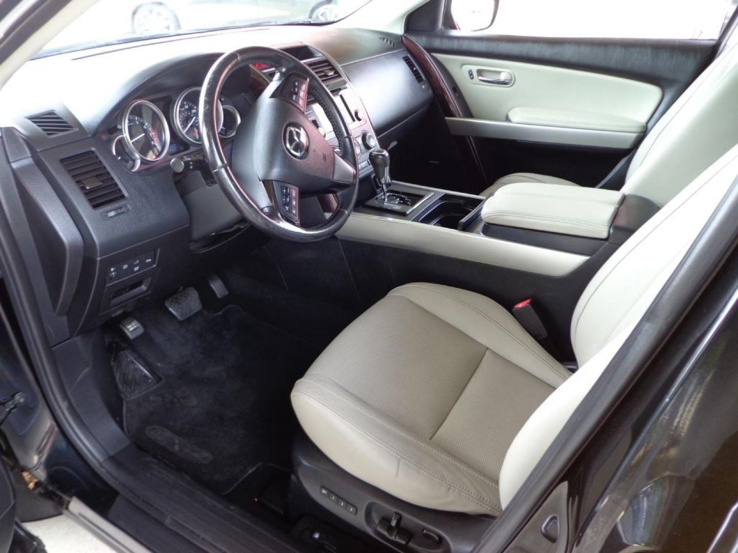 2014 BLACK MAZDA CX-9 GRAND TOURING (JM3TB3DV2E0) with an 3.7L engine, Automatic transmission, located at 6610 L St., Omaha, NE, 68117, (402) 731-7800, 41.212872, -96.014702 - THIS VEHICLE HAS A BEEN FULLY INSPECTED AND HAS A CLEAN TITLE WITH A FREE CARFAX REPORT PROVIDED! 2-OWNER, CLEAN CARFAX, LOW MILEAGE, LOADED WITH OPTIONS AND NEWER TIRES! *****We have found that most customers do the majority of their shopping online before visiting a ealership. For this reason- Photo#14