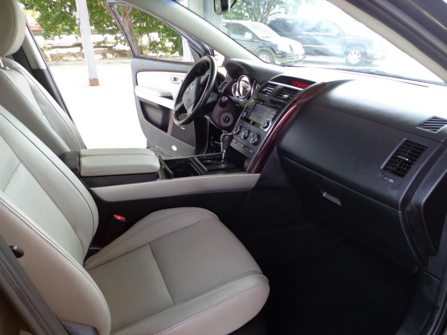 2014 BLACK MAZDA CX-9 GRAND TOURING (JM3TB3DV2E0) with an 3.7L engine, Automatic transmission, located at 6610 L St., Omaha, NE, 68117, (402) 731-7800, 41.212872, -96.014702 - THIS VEHICLE HAS A BEEN FULLY INSPECTED AND HAS A CLEAN TITLE WITH A FREE CARFAX REPORT PROVIDED! 2-OWNER, CLEAN CARFAX, LOW MILEAGE, LOADED WITH OPTIONS AND NEWER TIRES! *****We have found that most customers do the majority of their shopping online before visiting a ealership. For this reason- Photo#17