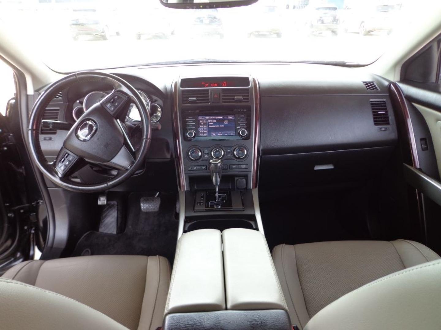 2014 BLACK MAZDA CX-9 GRAND TOURING (JM3TB3DV2E0) with an 3.7L engine, Automatic transmission, located at 6610 L St., Omaha, NE, 68117, (402) 731-7800, 41.212872, -96.014702 - THIS VEHICLE HAS A BEEN FULLY INSPECTED AND HAS A CLEAN TITLE WITH A FREE CARFAX REPORT PROVIDED! 2-OWNER, CLEAN CARFAX, LOW MILEAGE, LOADED WITH OPTIONS AND NEWER TIRES! *****We have found that most customers do the majority of their shopping online before visiting a ealership. For this reason- Photo#24