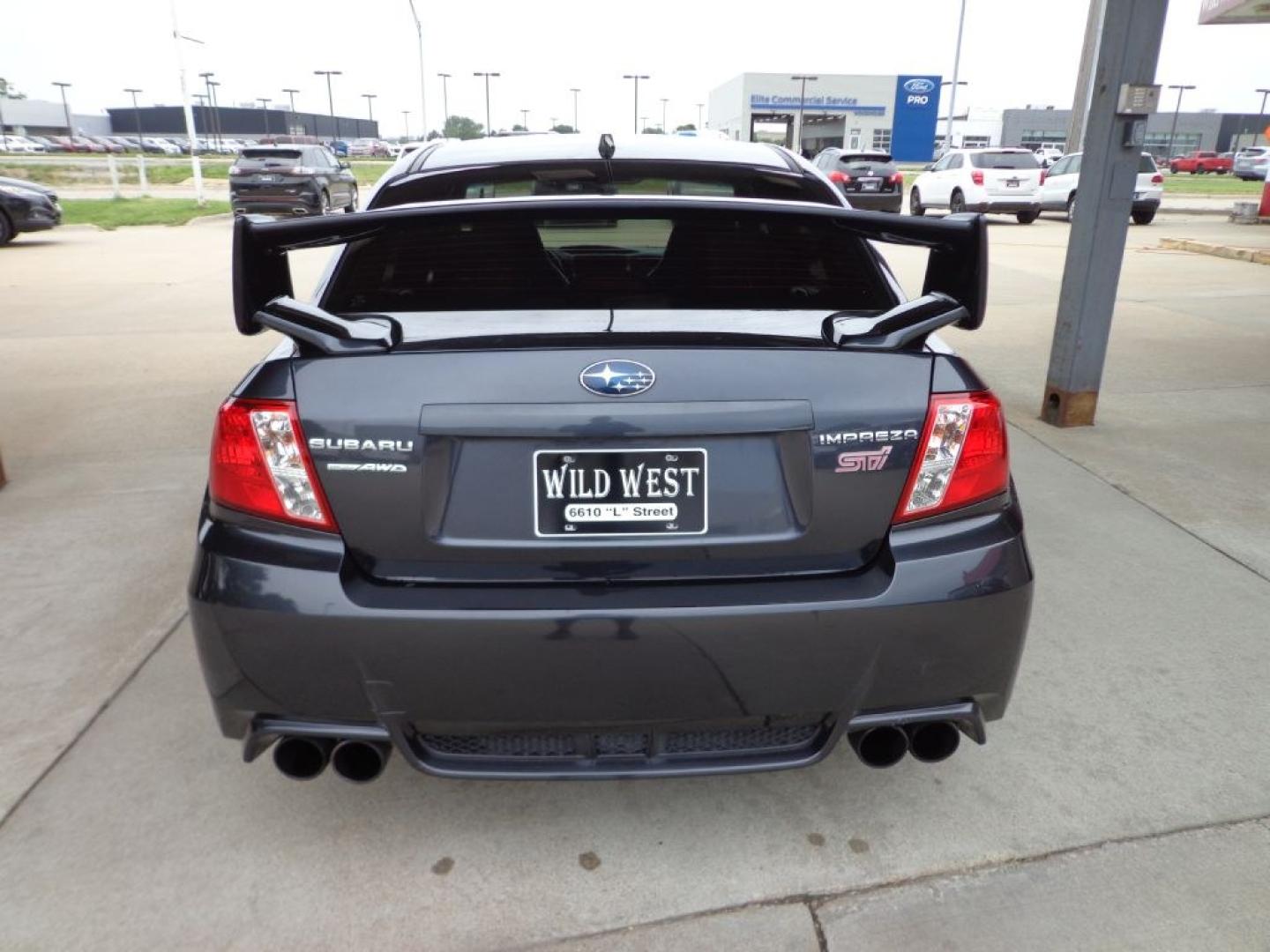 2014 GRAY SUBARU IMPREZA WRX STI LIMITED (JF1GV8J64EL) with an 2.5L engine, 6-Speed Manual transmission, located at 6610 L St., Omaha, NE, 68117, (402) 731-7800, 41.212872, -96.014702 - THIS VEHICLE HAS A BEEN FULLY INSPECTED AND HAS A CLEAN TITLE WITH A FREE CARFAX REPORT PROVIDED! SHARP LOW MILE STI WITH A CLEAN CARFAX, HEATED LEATHER, SUNROOF AND NEWER TIRES! *****We have found that most customers do the majority of their shopping online before visiting a ealership. For thi- Photo#4