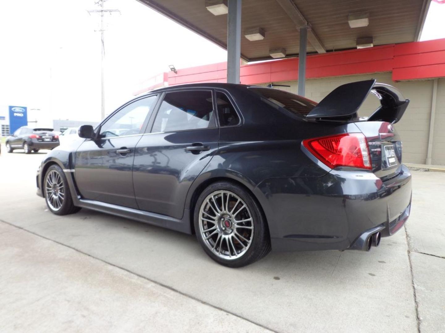 2014 GRAY SUBARU IMPREZA WRX STI LIMITED (JF1GV8J64EL) with an 2.5L engine, 6-Speed Manual transmission, located at 6610 L St., Omaha, NE, 68117, (402) 731-7800, 41.212872, -96.014702 - THIS VEHICLE HAS A BEEN FULLY INSPECTED AND HAS A CLEAN TITLE WITH A FREE CARFAX REPORT PROVIDED! SHARP LOW MILE STI WITH A CLEAN CARFAX, HEATED LEATHER, SUNROOF AND NEWER TIRES! *****We have found that most customers do the majority of their shopping online before visiting a ealership. For thi- Photo#5