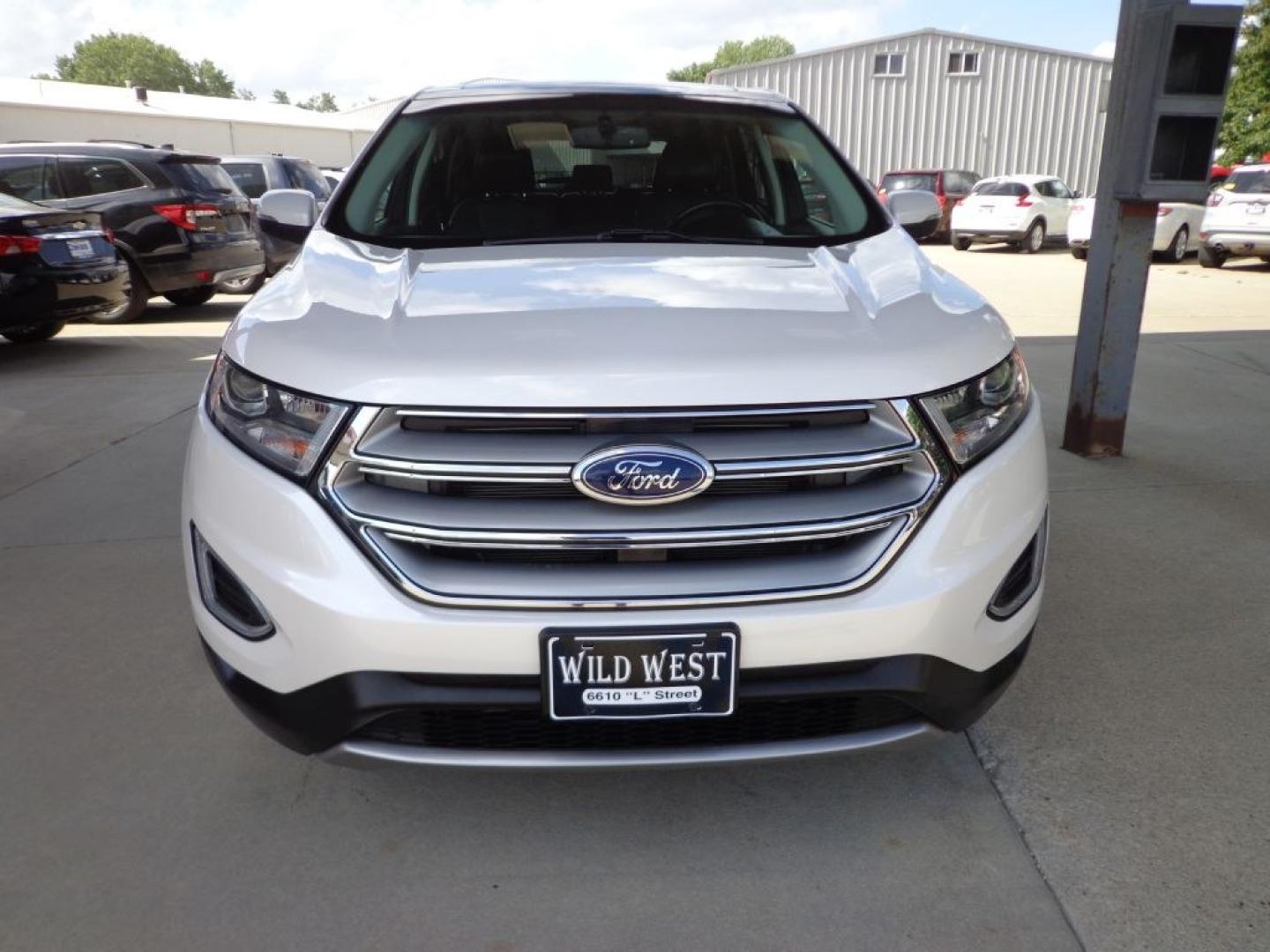 2018 WHITE FORD EDGE TITANIUM (2FMPK4K96JB) with an 2.0L engine, Automatic transmission, located at 6610 L St., Omaha, NE, 68117, (402) 731-7800, 41.212872, -96.014702 - THIS VEHICLE HAS A BEEN FULLY INSPECTED AND HAS A CLEAN TITLE WITH A FREE CARFAX REPORT PROVIDED! 2-OWNER, CLEAN CARFAX, LOW MILEAGE, PANO ROOF, NAV, NEWER TIRES AND MUCH MORE! *****We have found that most customers do the majority of their shopping online before visiting a ealership. For this- Photo#1