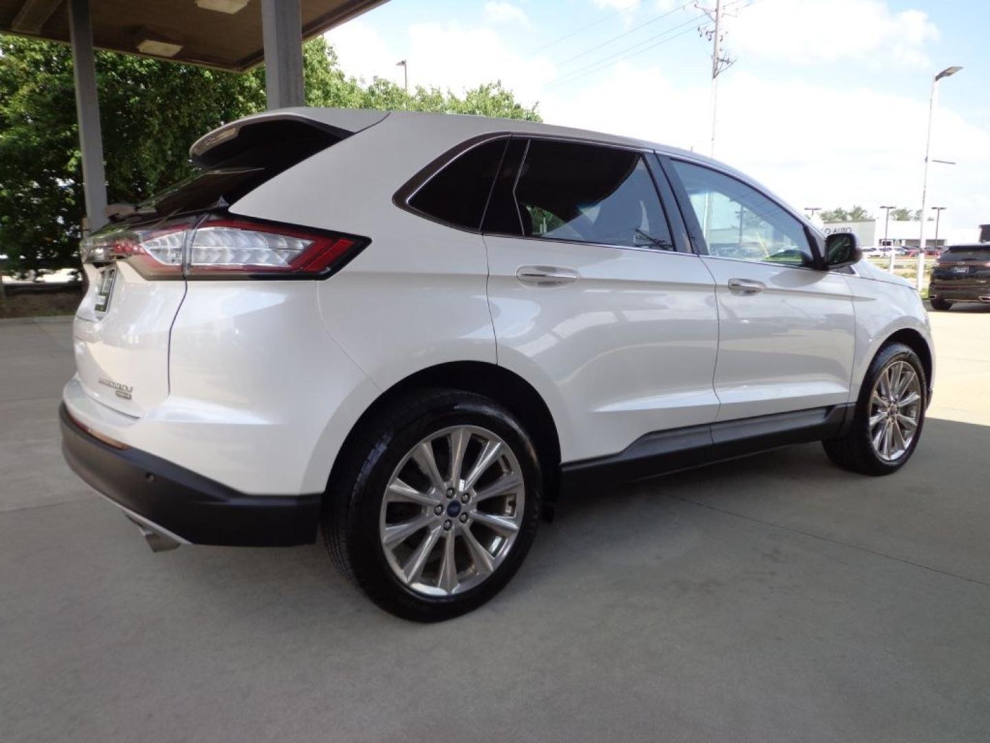 2018 WHITE FORD EDGE TITANIUM (2FMPK4K96JB) with an 2.0L engine, Automatic transmission, located at 6610 L St., Omaha, NE, 68117, (402) 731-7800, 41.212872, -96.014702 - THIS VEHICLE HAS A BEEN FULLY INSPECTED AND HAS A CLEAN TITLE WITH A FREE CARFAX REPORT PROVIDED! 2-OWNER, CLEAN CARFAX, LOW MILEAGE, PANO ROOF, NAV, NEWER TIRES AND MUCH MORE! *****We have found that most customers do the majority of their shopping online before visiting a ealership. For this- Photo#3