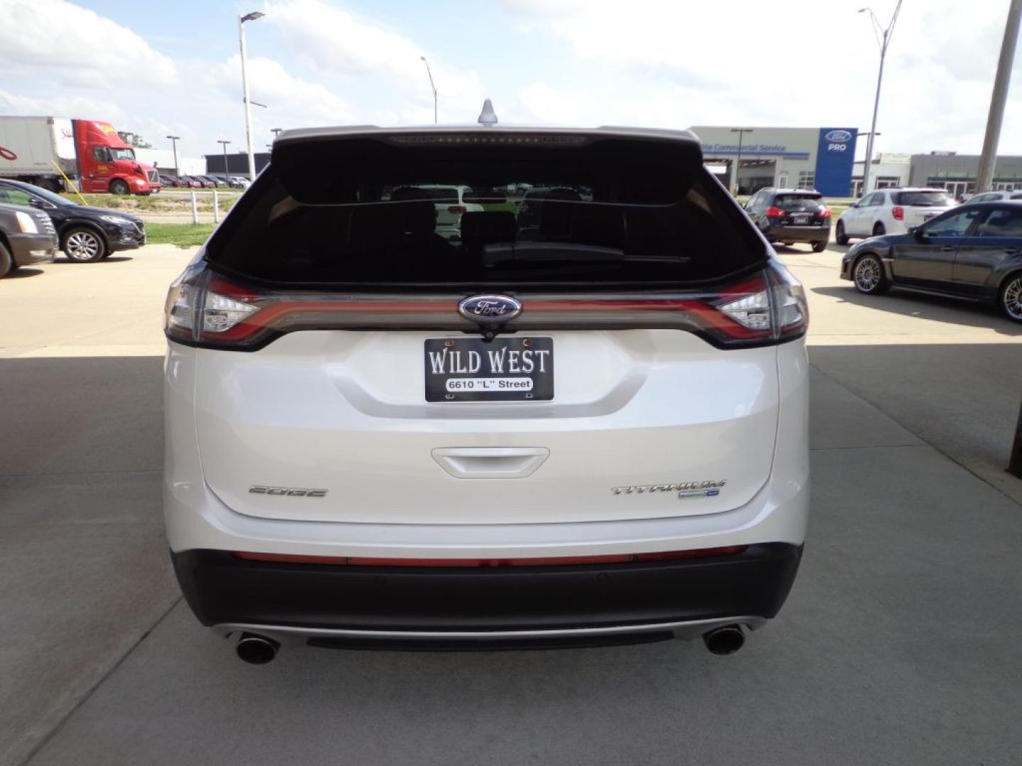 2018 WHITE FORD EDGE TITANIUM (2FMPK4K96JB) with an 2.0L engine, Automatic transmission, located at 6610 L St., Omaha, NE, 68117, (402) 731-7800, 41.212872, -96.014702 - THIS VEHICLE HAS A BEEN FULLY INSPECTED AND HAS A CLEAN TITLE WITH A FREE CARFAX REPORT PROVIDED! 2-OWNER, CLEAN CARFAX, LOW MILEAGE, PANO ROOF, NAV, NEWER TIRES AND MUCH MORE! *****We have found that most customers do the majority of their shopping online before visiting a ealership. For this- Photo#4