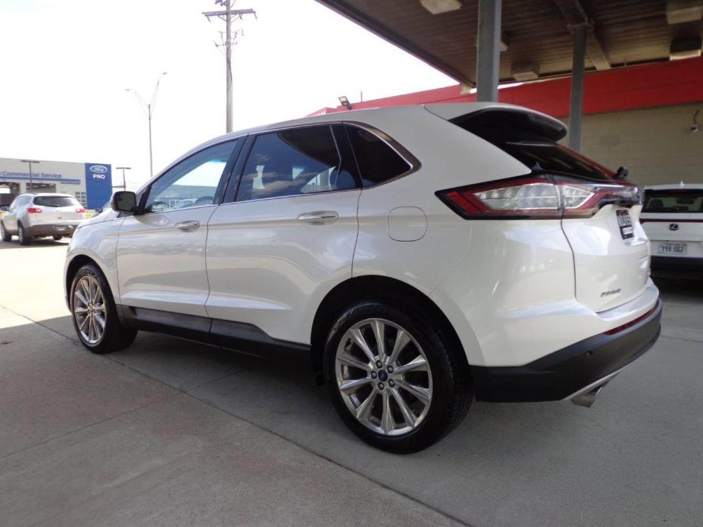 2018 WHITE FORD EDGE TITANIUM (2FMPK4K96JB) with an 2.0L engine, Automatic transmission, located at 6610 L St., Omaha, NE, 68117, (402) 731-7800, 41.212872, -96.014702 - THIS VEHICLE HAS A BEEN FULLY INSPECTED AND HAS A CLEAN TITLE WITH A FREE CARFAX REPORT PROVIDED! 2-OWNER, CLEAN CARFAX, LOW MILEAGE, PANO ROOF, NAV, NEWER TIRES AND MUCH MORE! *****We have found that most customers do the majority of their shopping online before visiting a ealership. For this- Photo#5