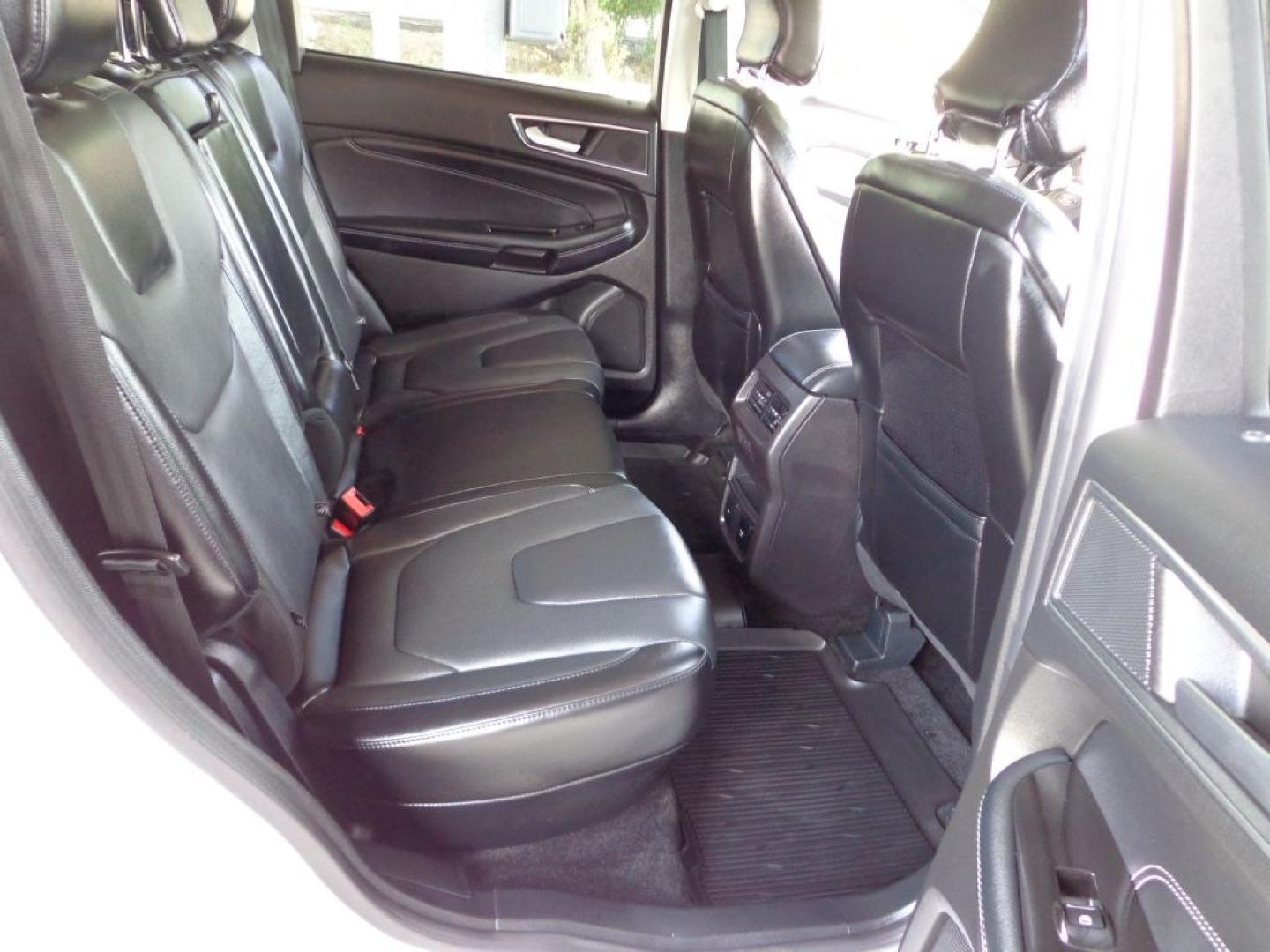2018 WHITE FORD EDGE TITANIUM (2FMPK4K96JB) with an 2.0L engine, Automatic transmission, located at 6610 L St., Omaha, NE, 68117, (402) 731-7800, 41.212872, -96.014702 - THIS VEHICLE HAS A BEEN FULLY INSPECTED AND HAS A CLEAN TITLE WITH A FREE CARFAX REPORT PROVIDED! 2-OWNER, CLEAN CARFAX, LOW MILEAGE, PANO ROOF, NAV, NEWER TIRES AND MUCH MORE! *****We have found that most customers do the majority of their shopping online before visiting a ealership. For this- Photo#18