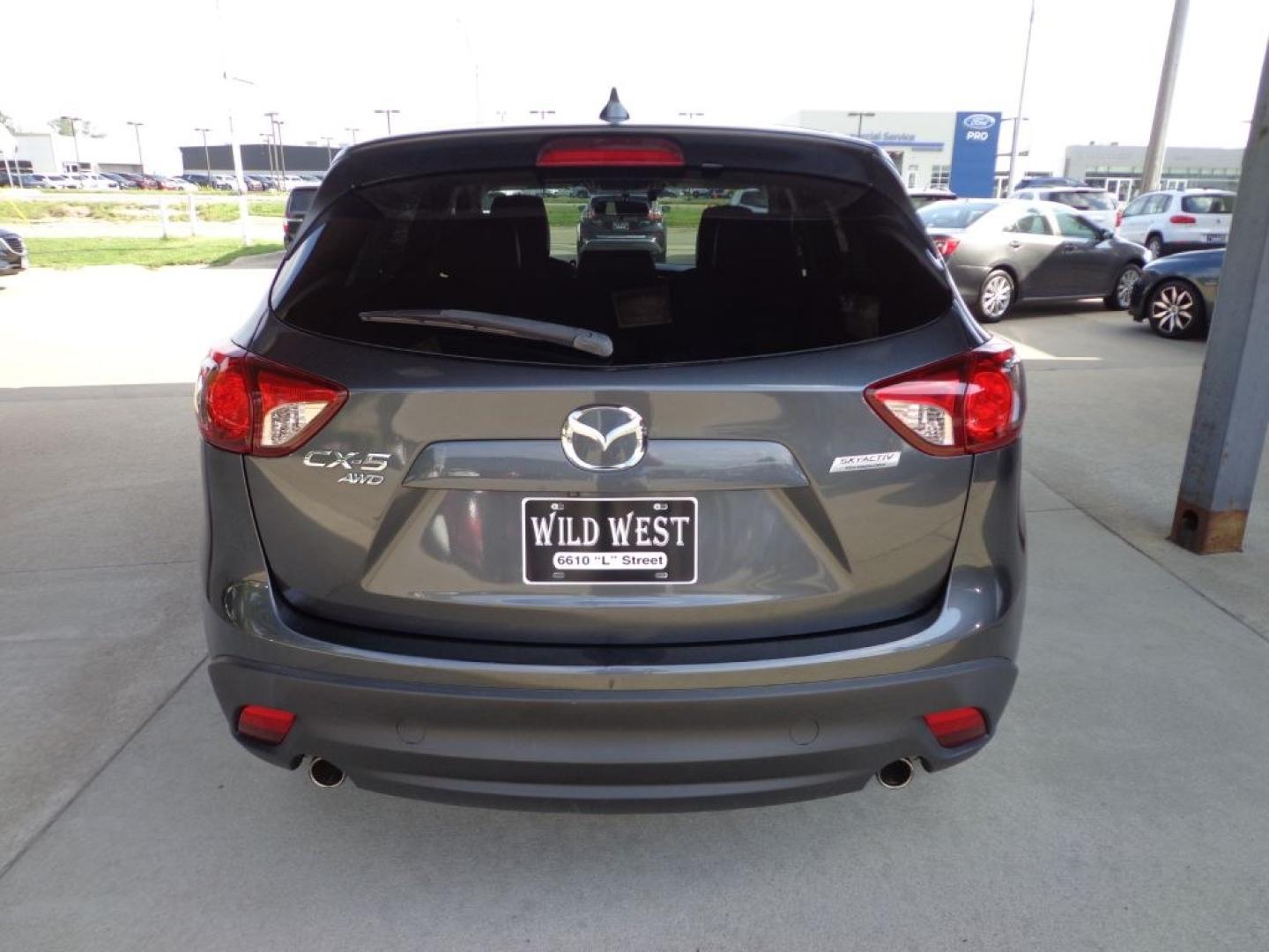 2016 GRAY MAZDA CX-5 GT (JM3KE4DY4G0) with an 2.5L engine, Automatic transmission, located at 6610 L St., Omaha, NE, 68117, (402) 731-7800, 41.212872, -96.014702 - THIS VEHICLE HAS A BEEN FULLY INSPECTED AND HAS A CLEAN TITLE WITH A FREE CARFAX REPORT PROVIDED! 1-OWNER, CLEAN CARFAX, LOW MILEAGE, NAV, SUNROOF, PREMIUM AUDIO, BLIND SPOT AND NEWER TIRES! *****We have found that most customers do the majority of their shopping online before visiting a ealers- Photo#4