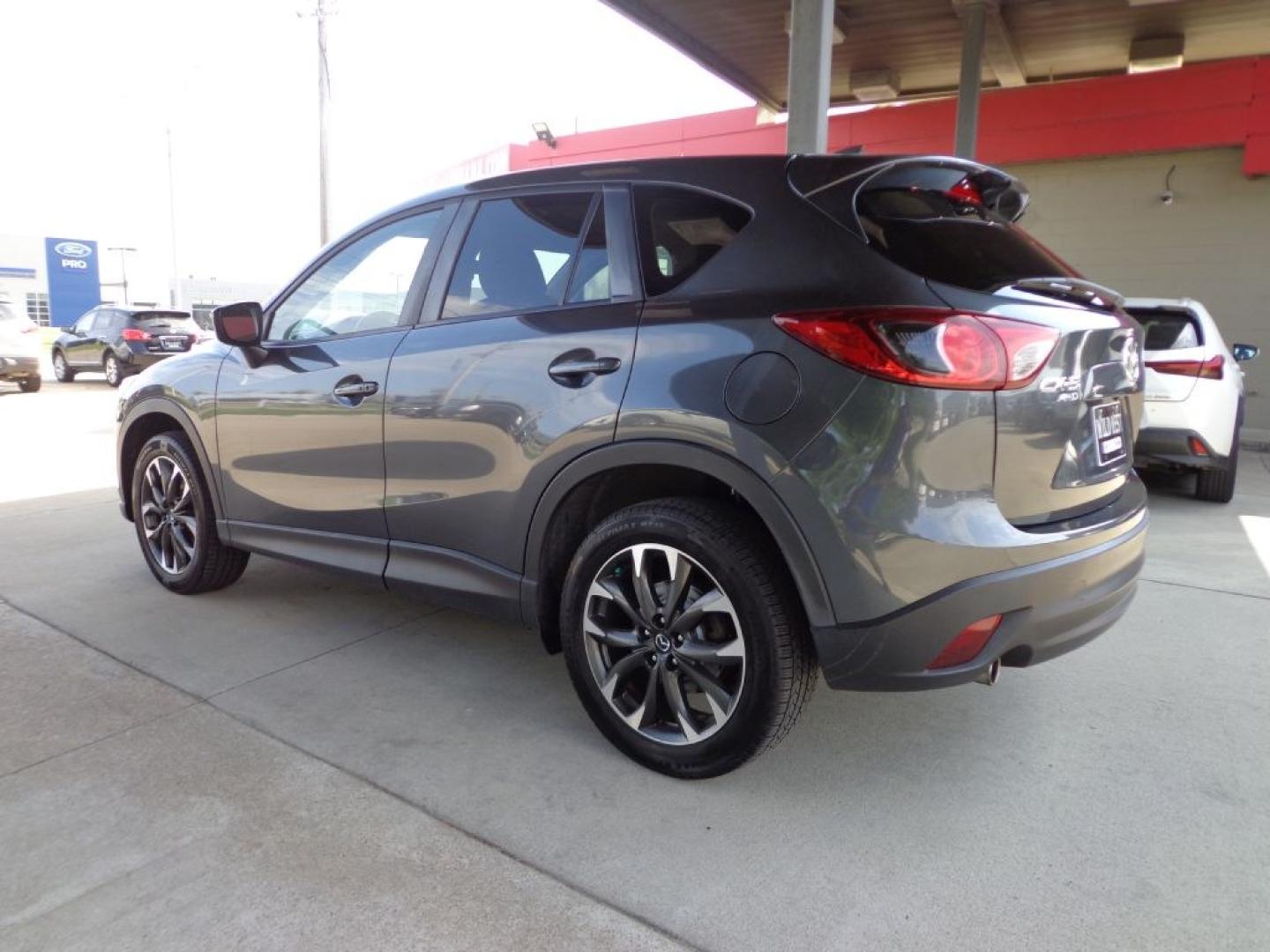 2016 GRAY MAZDA CX-5 GT (JM3KE4DY4G0) with an 2.5L engine, Automatic transmission, located at 6610 L St., Omaha, NE, 68117, (402) 731-7800, 41.212872, -96.014702 - THIS VEHICLE HAS A BEEN FULLY INSPECTED AND HAS A CLEAN TITLE WITH A FREE CARFAX REPORT PROVIDED! 1-OWNER, CLEAN CARFAX, LOW MILEAGE, NAV, SUNROOF, PREMIUM AUDIO, BLIND SPOT AND NEWER TIRES! *****We have found that most customers do the majority of their shopping online before visiting a ealers- Photo#5