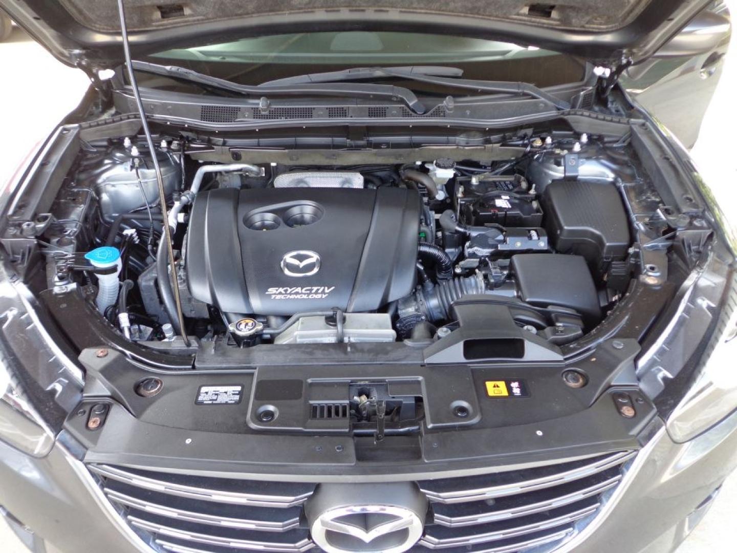 2016 GRAY MAZDA CX-5 GT (JM3KE4DY4G0) with an 2.5L engine, Automatic transmission, located at 6610 L St., Omaha, NE, 68117, (402) 731-7800, 41.212872, -96.014702 - THIS VEHICLE HAS A BEEN FULLY INSPECTED AND HAS A CLEAN TITLE WITH A FREE CARFAX REPORT PROVIDED! 1-OWNER, CLEAN CARFAX, LOW MILEAGE, NAV, SUNROOF, PREMIUM AUDIO, BLIND SPOT AND NEWER TIRES! *****We have found that most customers do the majority of their shopping online before visiting a ealers- Photo#11