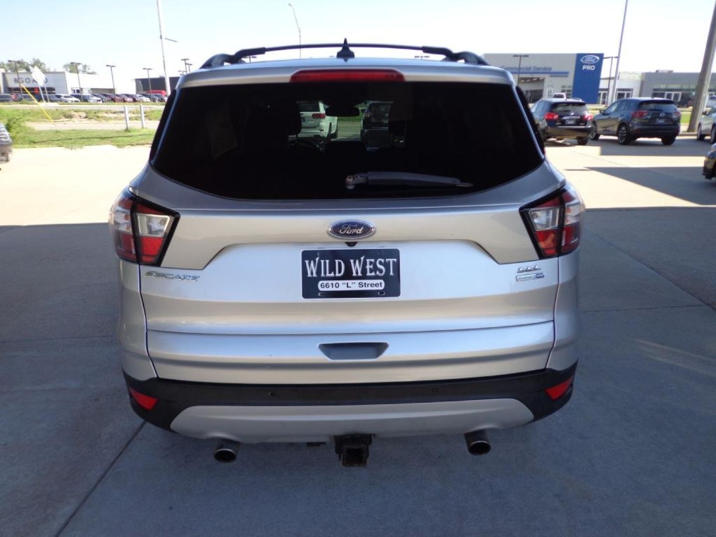 2018 SILVER FORD ESCAPE SEL (1FMCU9HD2JU) with an 1.5L engine, Automatic transmission, located at 6610 L St., Omaha, NE, 68117, (402) 731-7800, 41.212872, -96.014702 - THIS VEHICLE HAS A BEEN FULLY INSPECTED AND HAS A CLEAN TITLE WITH A FREE CARFAX REPORT PROVIDED! SHARP SEL WITH A CLEAN CARFAX, LOADED WITH PANORAMIC ROOF, NAV, FORD SAFE AND SMART PACKAGE INCLUDING, LANE KEEPING SYSTEM ,ADAPT CRUISE/COLLISION WARNING AND BLIS (BLIND SPOT INFO SYSTEM). ****- Photo#4
