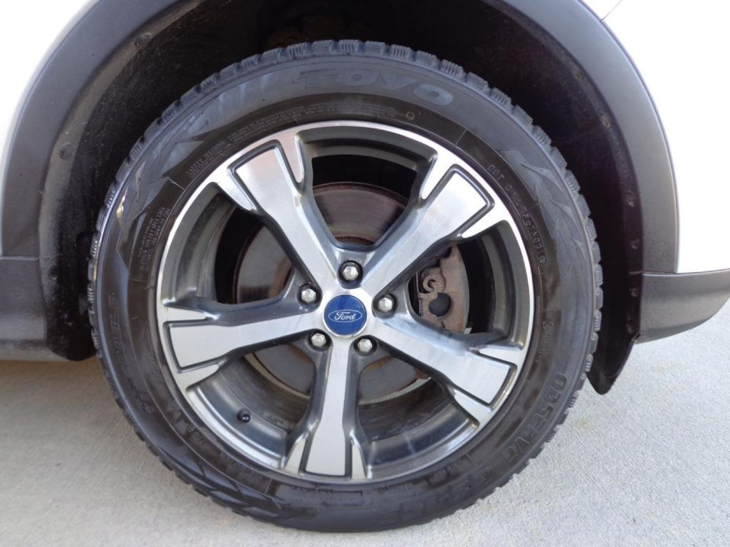 2018 SILVER FORD ESCAPE SEL (1FMCU9HD2JU) with an 1.5L engine, Automatic transmission, located at 6610 L St., Omaha, NE, 68117, (402) 731-7800, 41.212872, -96.014702 - THIS VEHICLE HAS A BEEN FULLY INSPECTED AND HAS A CLEAN TITLE WITH A FREE CARFAX REPORT PROVIDED! SHARP SEL WITH A CLEAN CARFAX, LOADED WITH PANORAMIC ROOF, NAV, FORD SAFE AND SMART PACKAGE INCLUDING, LANE KEEPING SYSTEM ,ADAPT CRUISE/COLLISION WARNING AND BLIS (BLIND SPOT INFO SYSTEM). ****- Photo#7