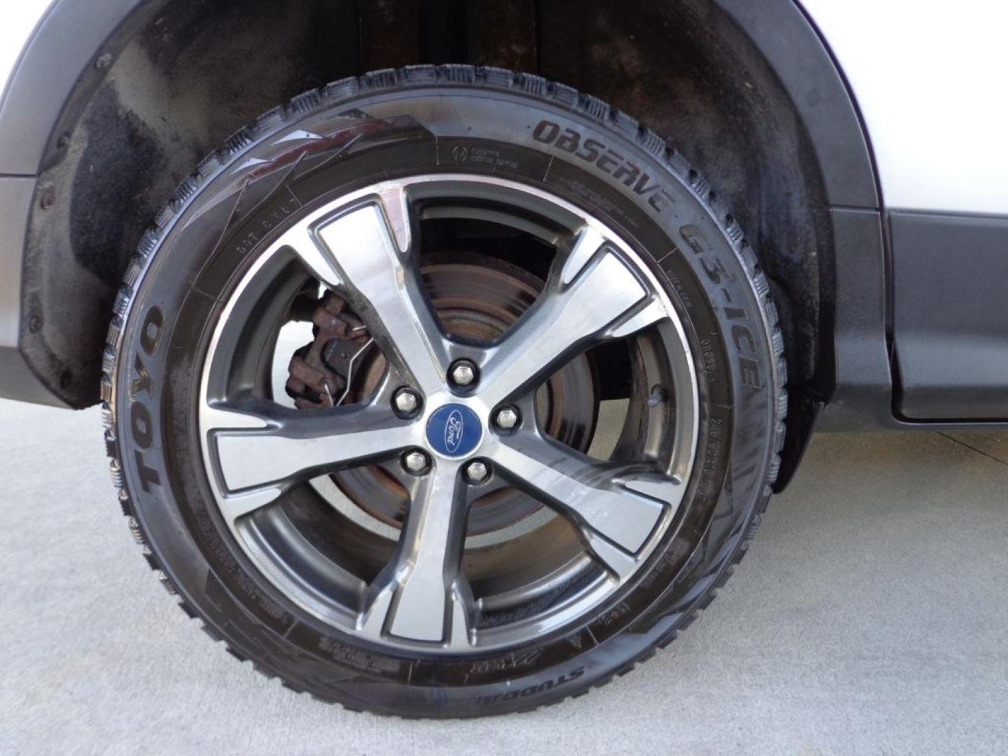 2018 SILVER FORD ESCAPE SEL (1FMCU9HD2JU) with an 1.5L engine, Automatic transmission, located at 6610 L St., Omaha, NE, 68117, (402) 731-7800, 41.212872, -96.014702 - THIS VEHICLE HAS A BEEN FULLY INSPECTED AND HAS A CLEAN TITLE WITH A FREE CARFAX REPORT PROVIDED! SHARP SEL WITH A CLEAN CARFAX, LOADED WITH PANORAMIC ROOF, NAV, FORD SAFE AND SMART PACKAGE INCLUDING, LANE KEEPING SYSTEM ,ADAPT CRUISE/COLLISION WARNING AND BLIS (BLIND SPOT INFO SYSTEM). ****- Photo#8